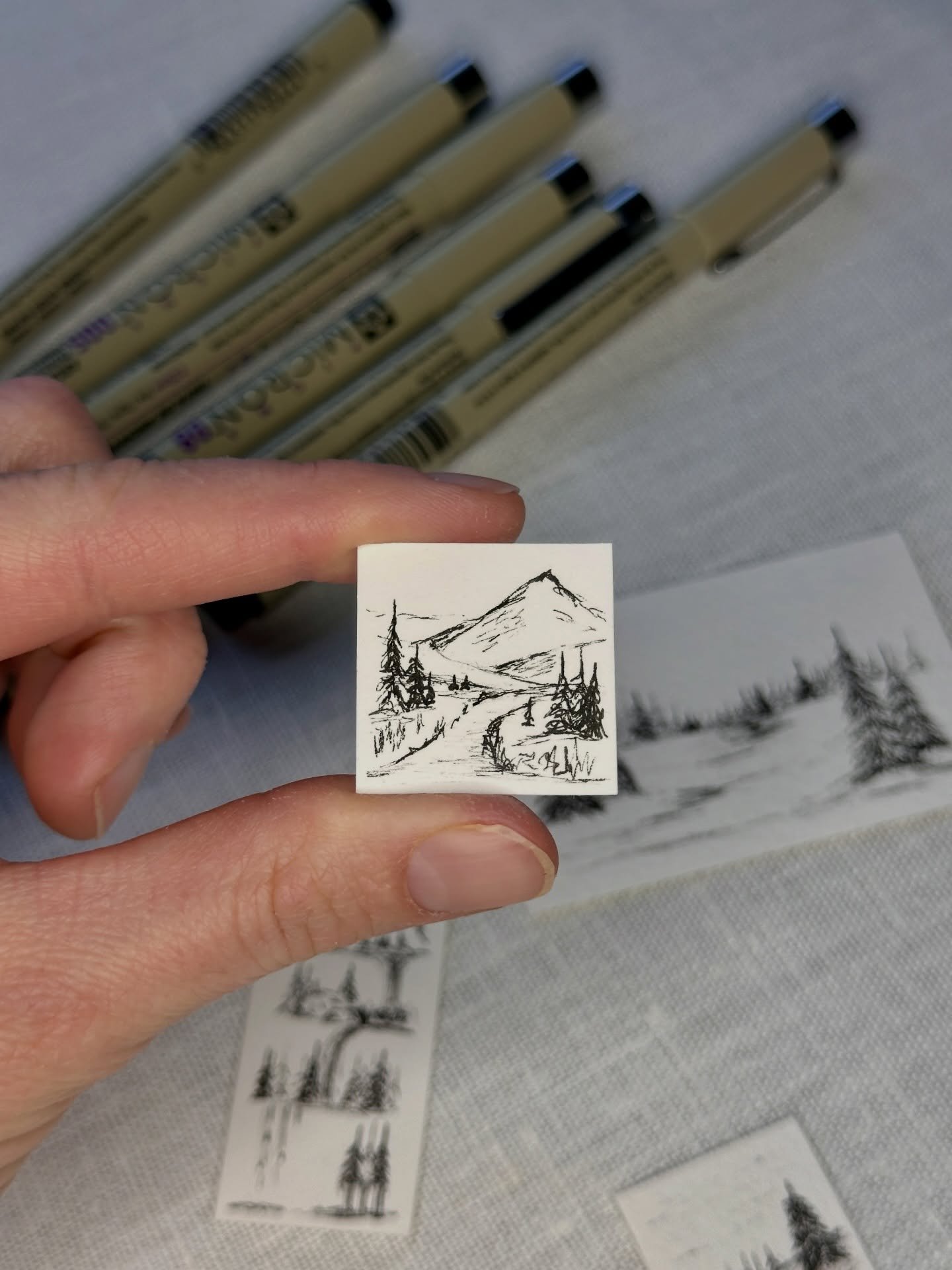 Five pen mini drawings from the studio. These measure only 1 x 1 inch. Can you spot the one that is drawn on rough paper instead of smooth paper?