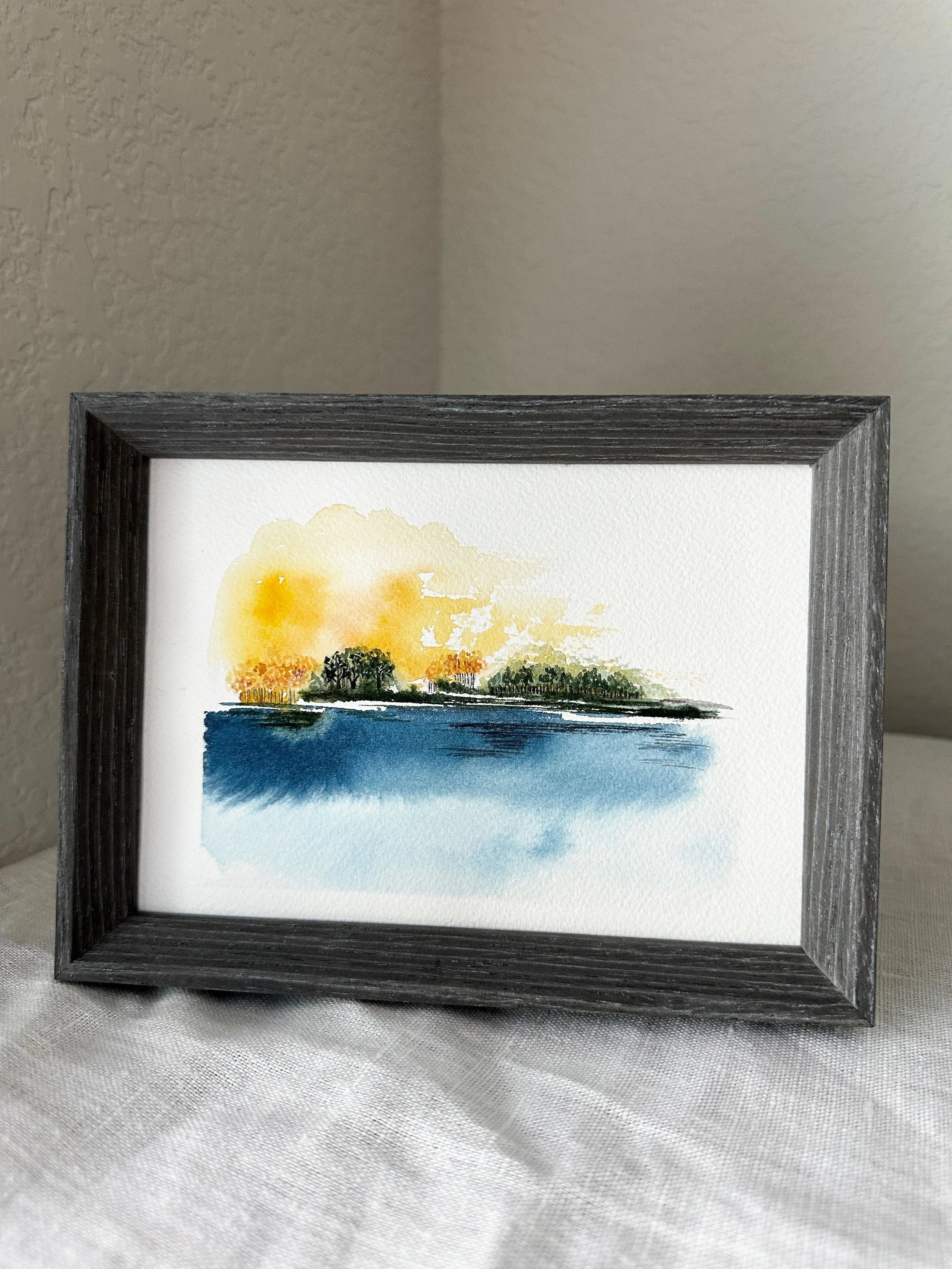 Golden Hour on the Lake
Unframed, $90, Original Watercolor Painting, 5x7 inches 
DM for details

Golden Hour was inspired by summers at the lake up in Maine, where my Grandparents had a cabin. The summer days were long and filled with time with famil