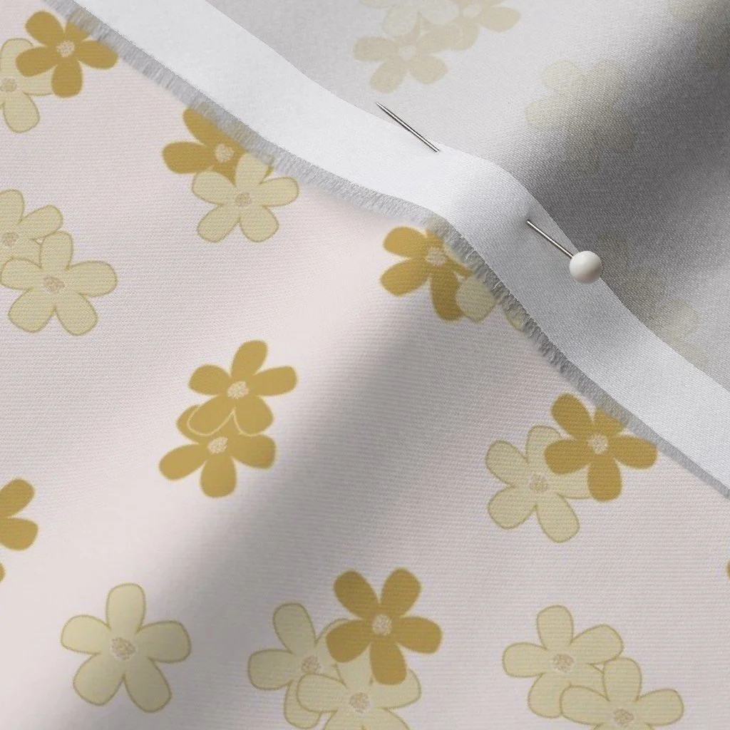 fabric featuring scatters small yellow flowers