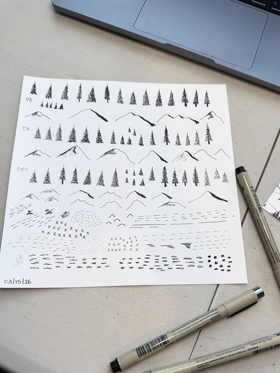 page of pen drawings of mountains and trees