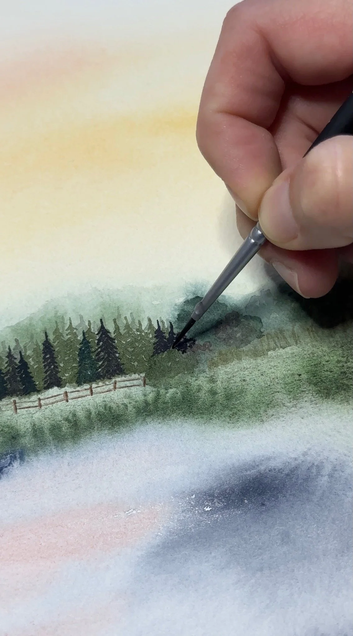 detail shot of a abstract watercolor with pine trees