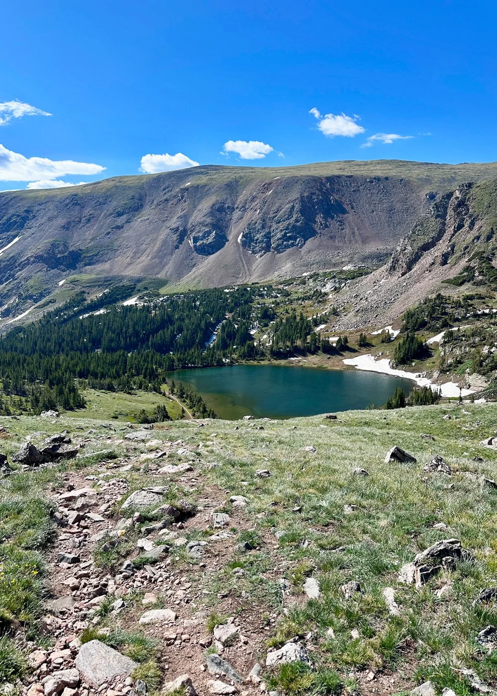 photograph of an alpine mountain lake from above