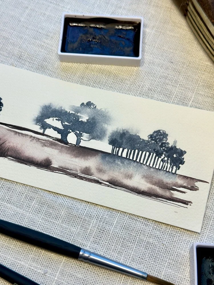 detail shot of abstract watercolor landscape featuring silhouetted trees