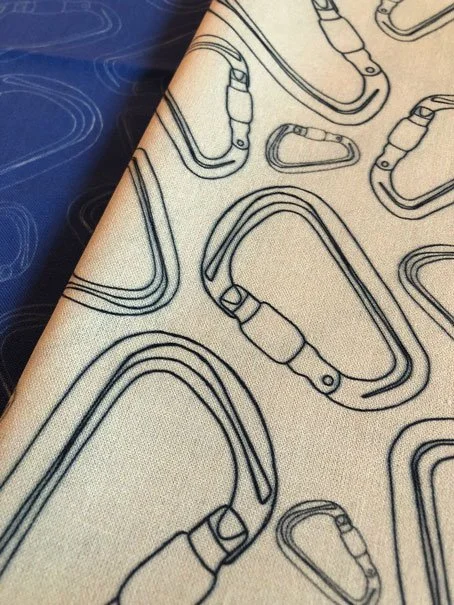 Yellow fabric with a carabiner pattern