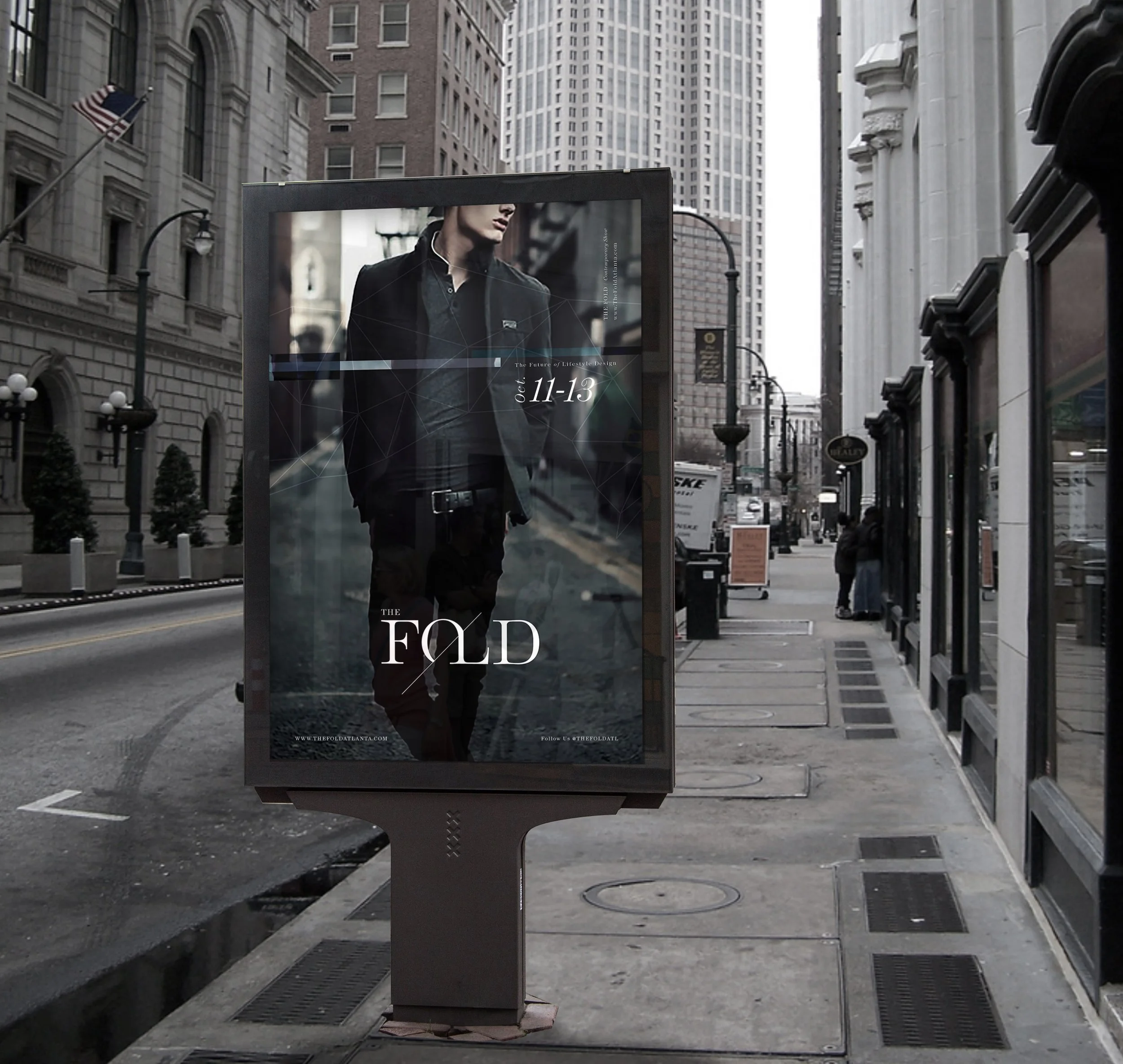 A city street with tall buildings, streetlights, and an electronic billboard showing a fashion model with text about an event from October 11-13.