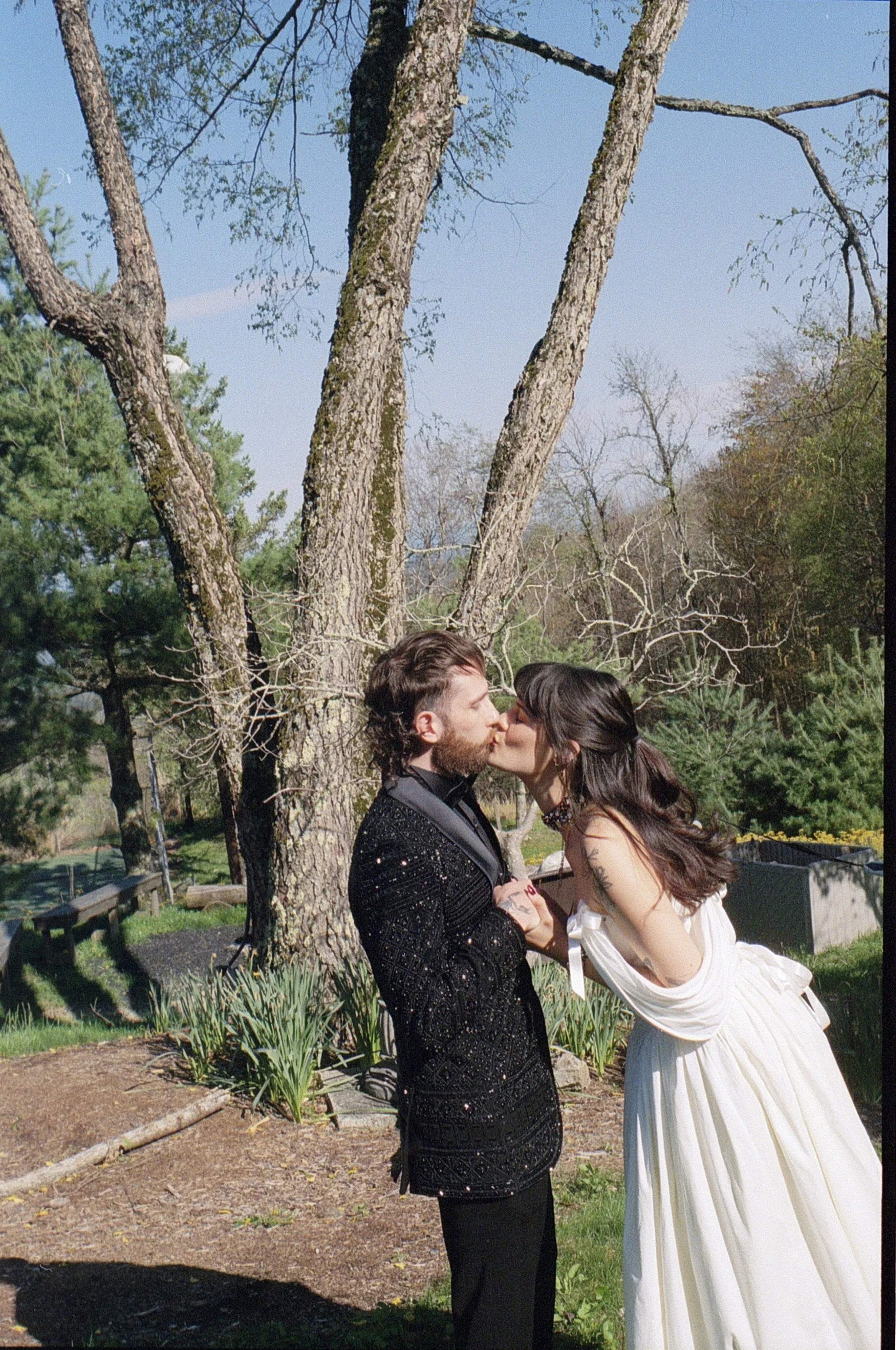 couple kissing on their wedding day in boone north carolina on film