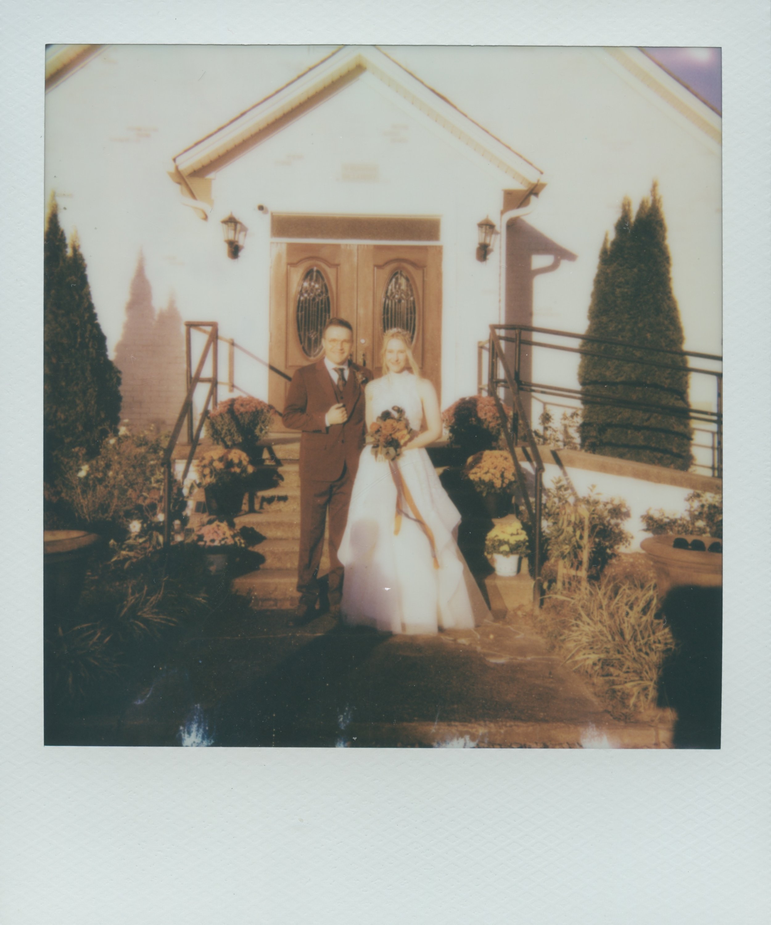 heirloom portrait of a couple on their wedding day on polaroid