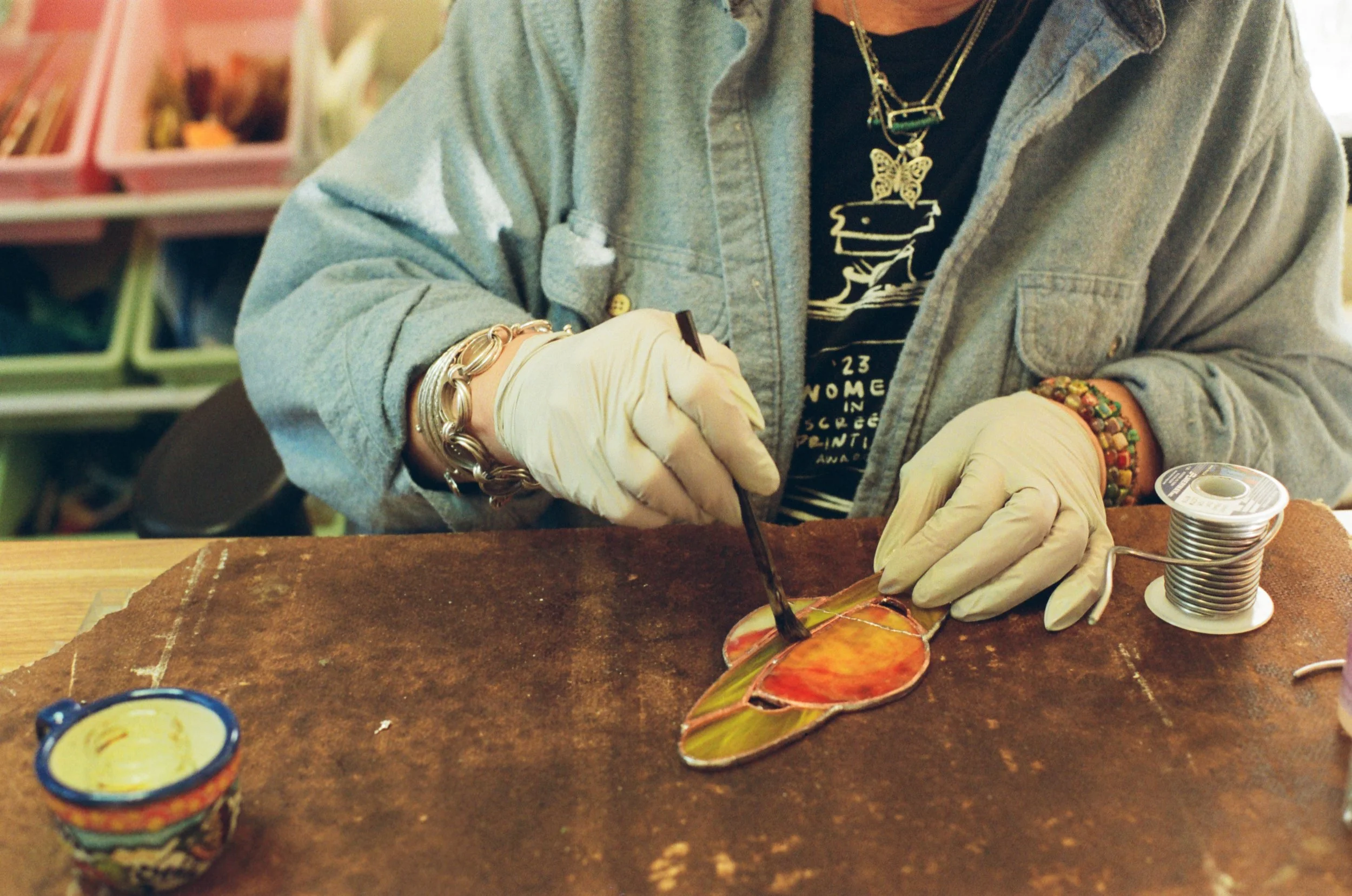 colorful stained glass branding session making a saturn inspired glass on film