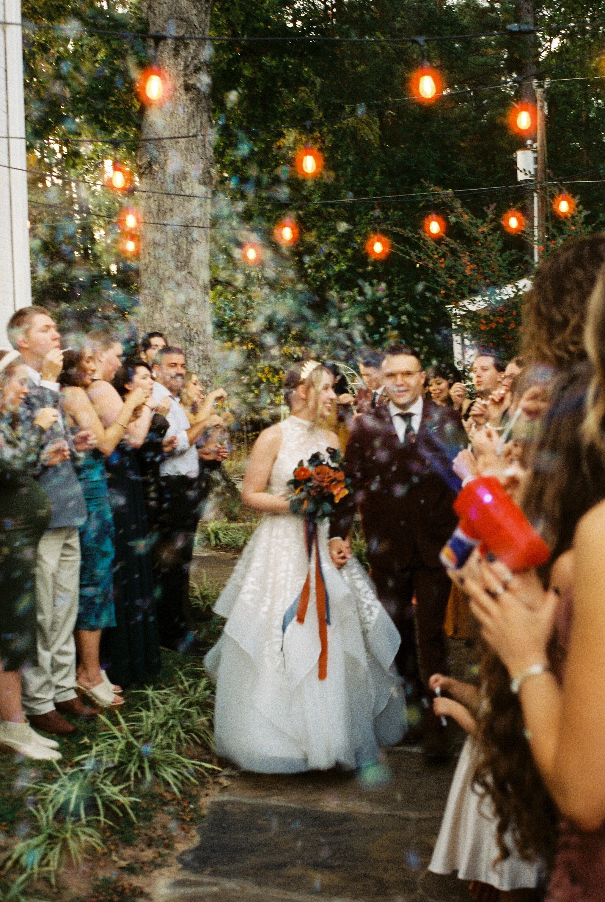 bubble send off on a beautiful fall wedding day on film