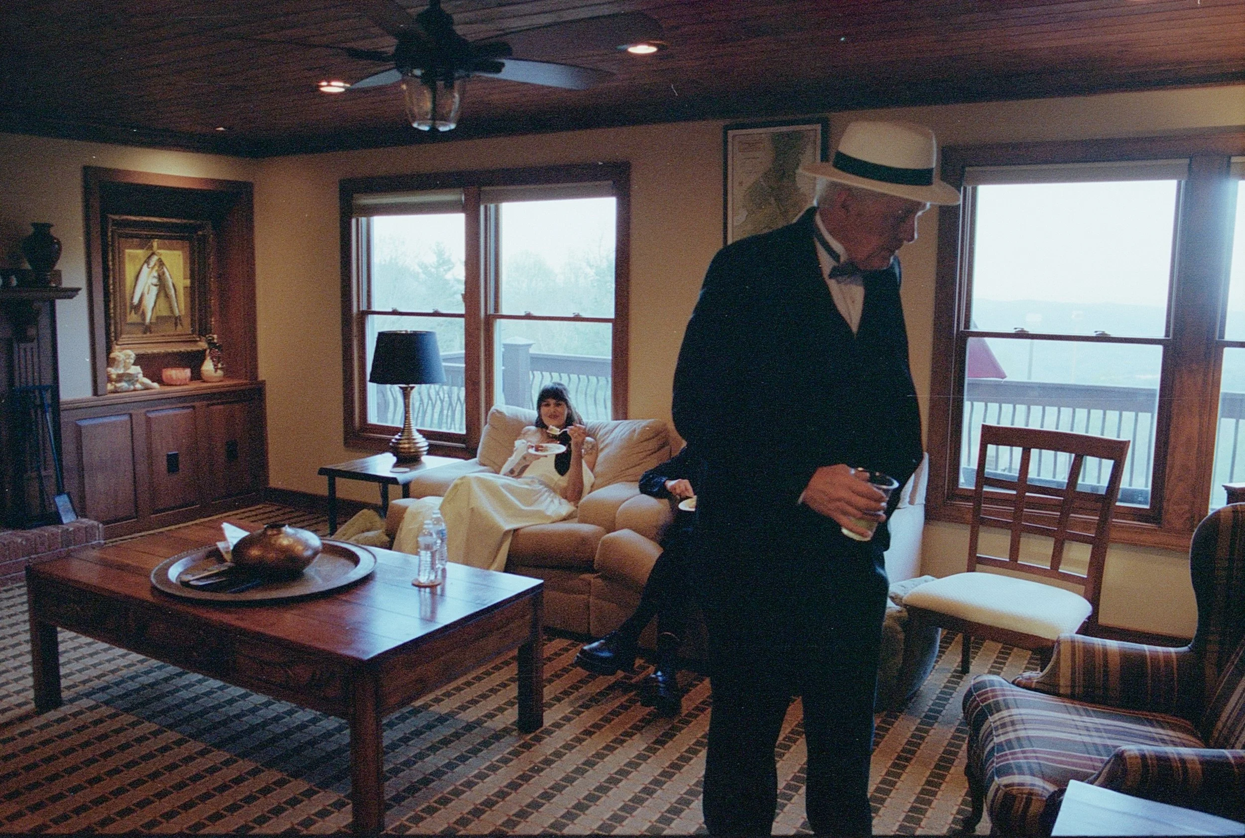 bride eating cake in vintage cabin