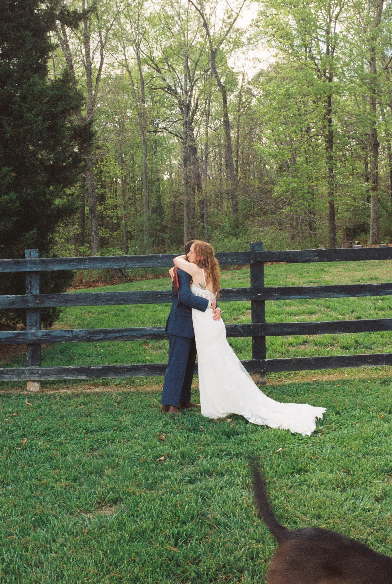 brides embracing each other after private vow reading