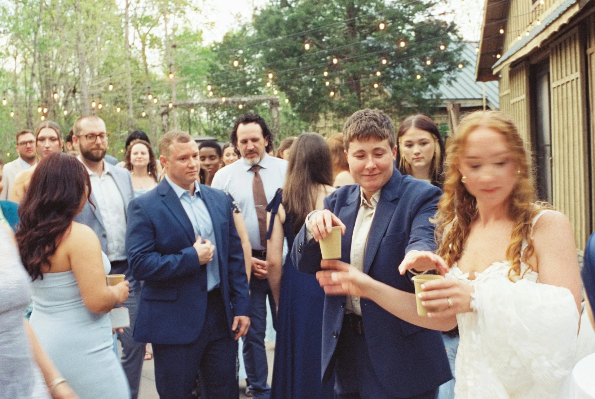 brides handing out cacao for wedding ceremony