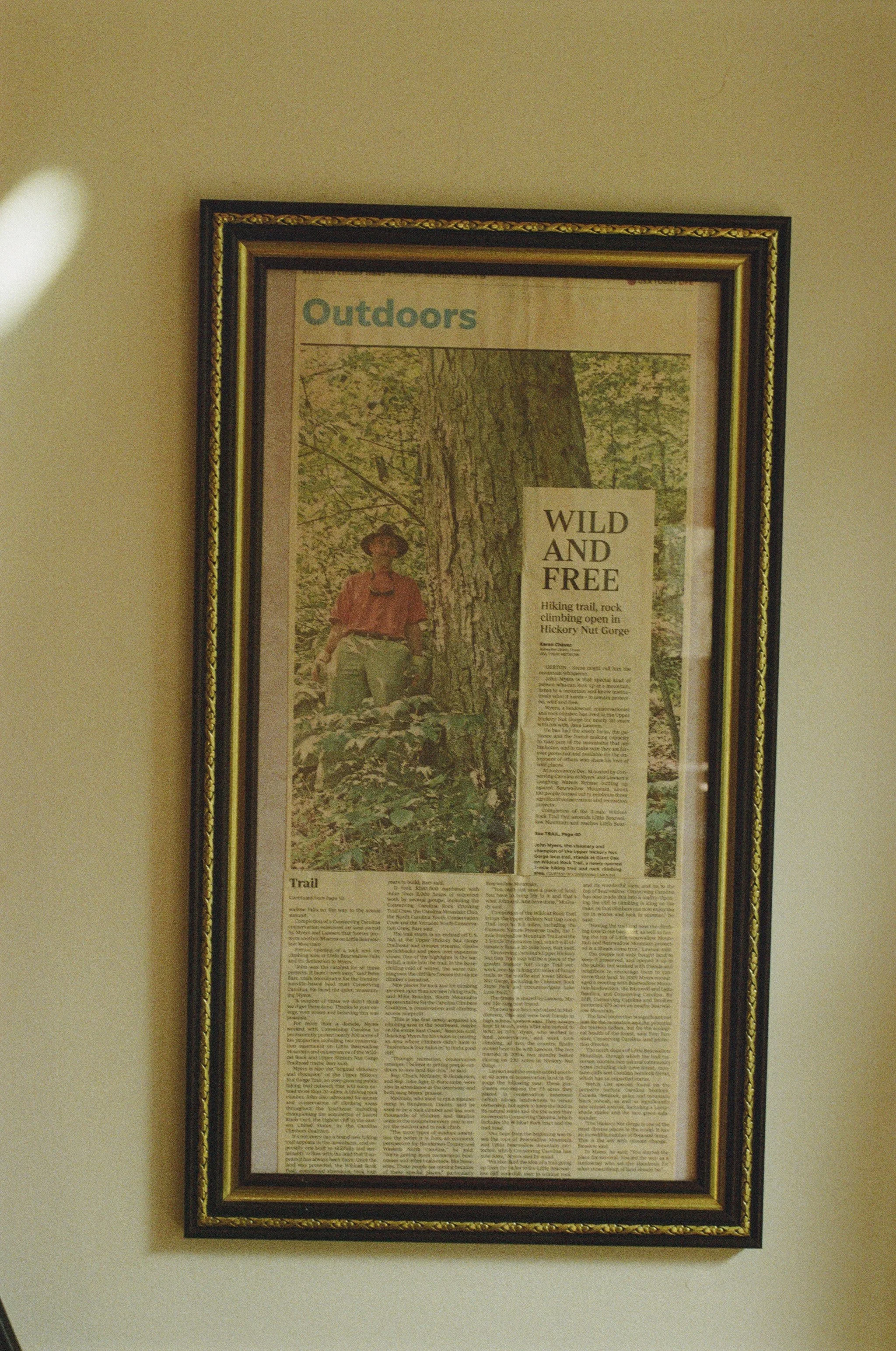 wild and free newspaper clipping in cabin