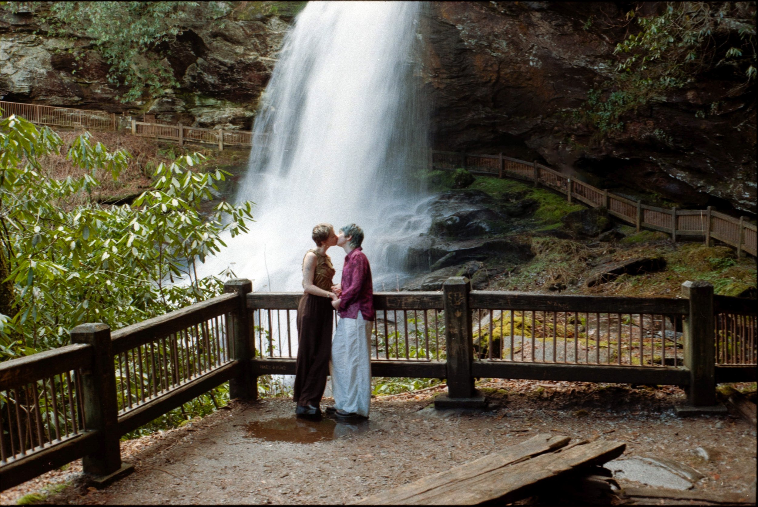 magical waterfall engagement photos in the mountains of north carolina