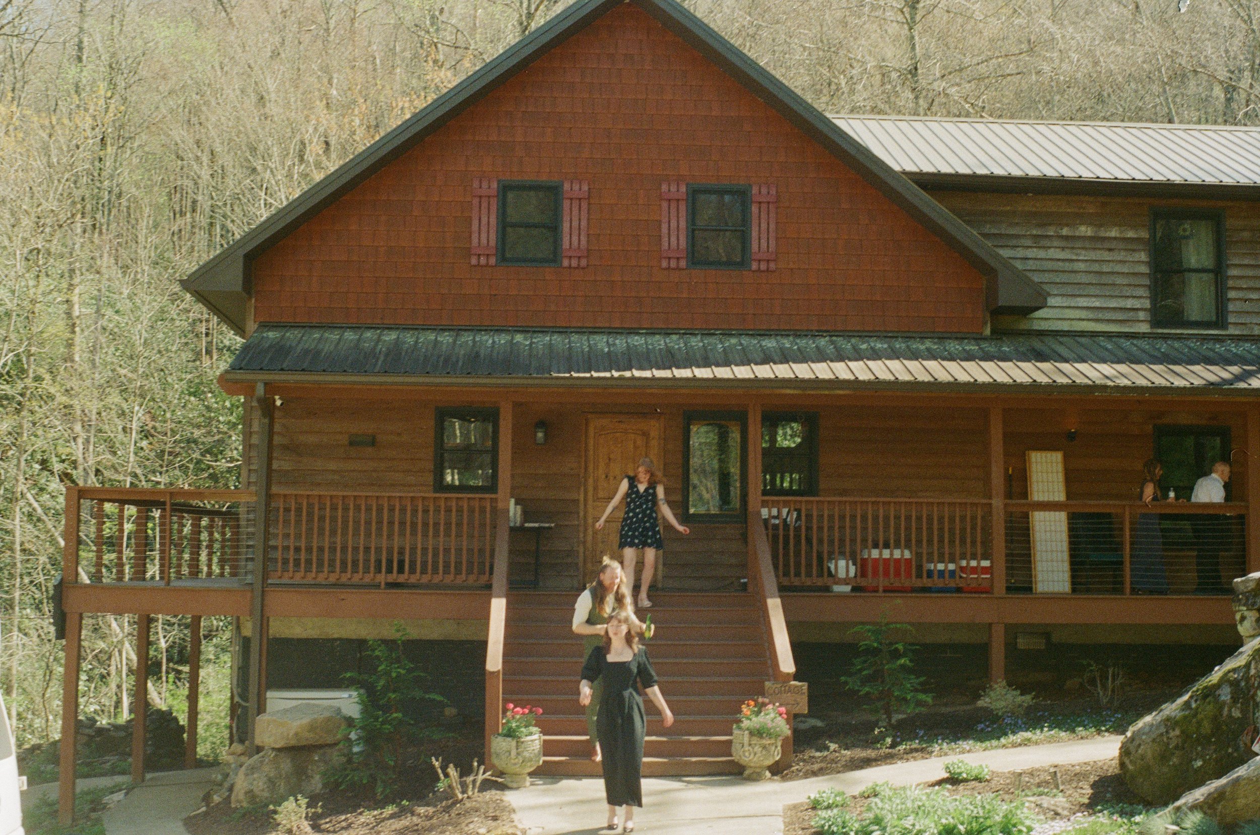 red cabin in the woods wedding venue