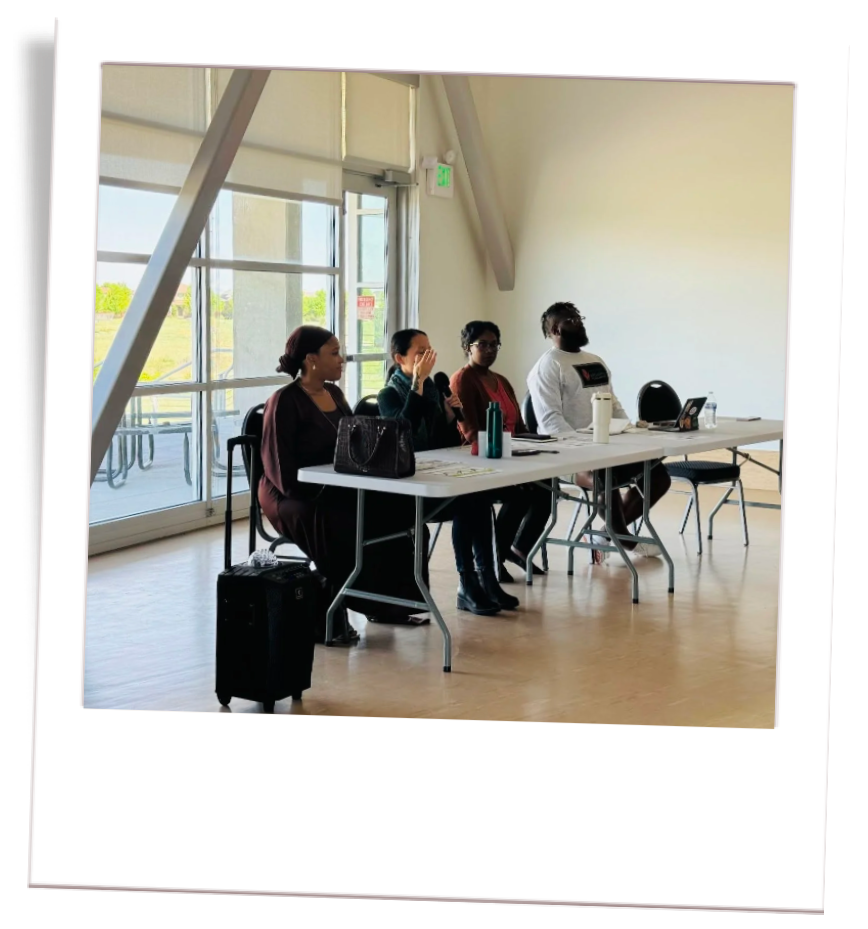 Liz Zhou & colleagues sitting at panel for community wellness workshop in Denver, Colorado