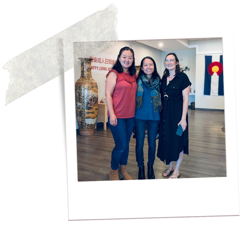Liz Zhou & colleagues smiling at workshop for Asian American community in Denver, Colorado