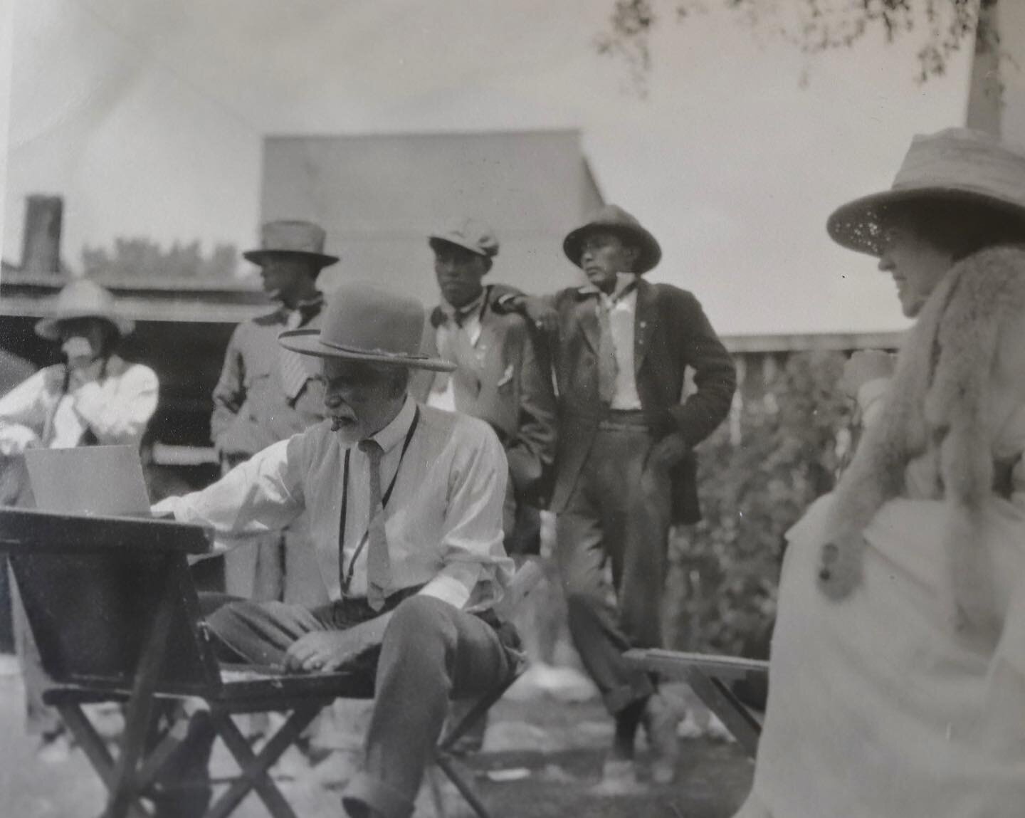 Julius Rolshoven at the easel, circa 1917-1918.  His wife Harriette can be seen on the right.  Unknown characters in the background. 

Rolshoven was pretty much world famous.  He settled in the southwest around 1916; he had a studio at the Palace of 