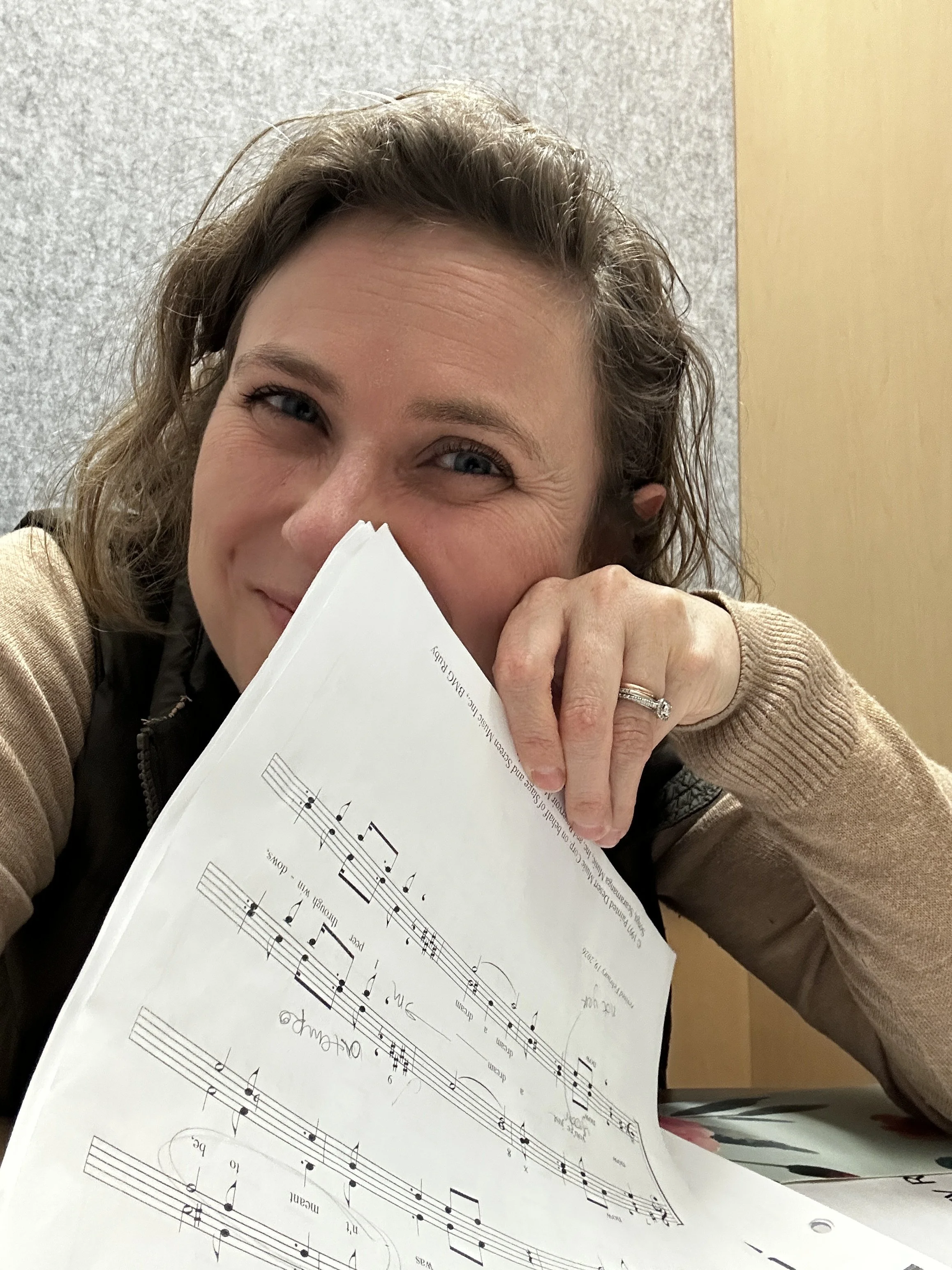 Practicing choir music. Waiting for my husband’s concert to begin.