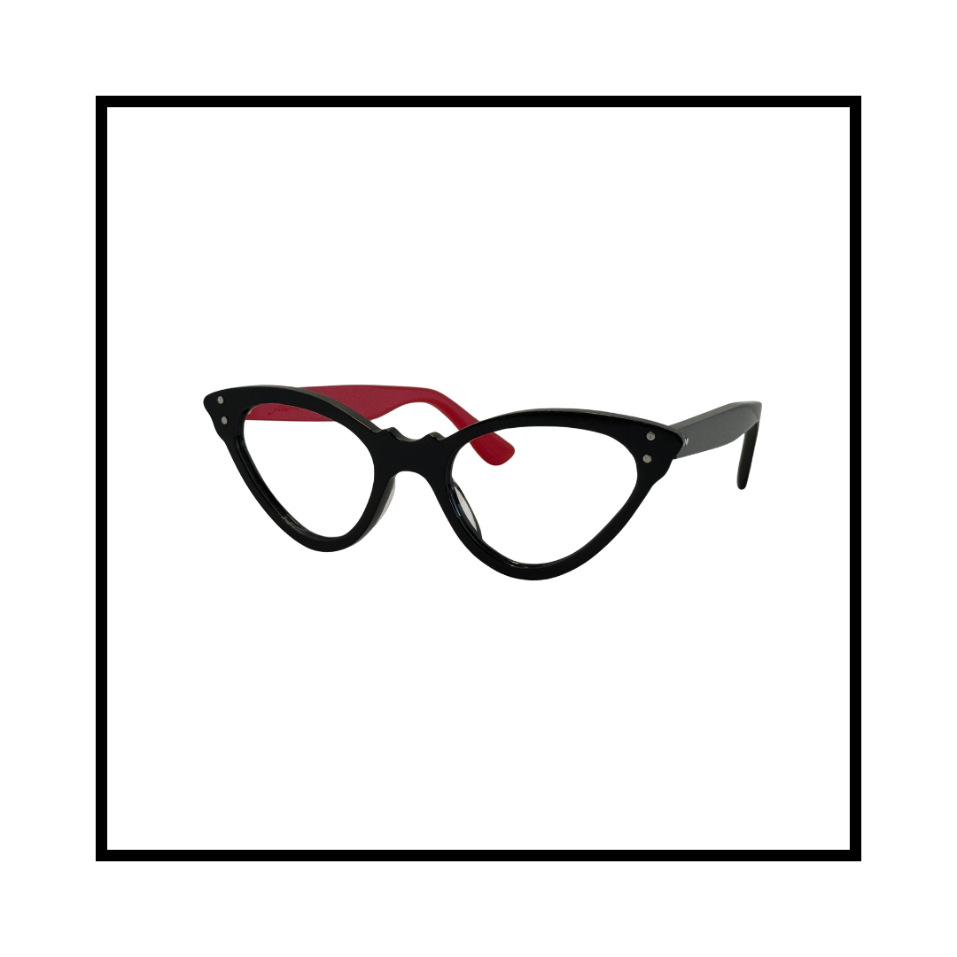 Black cat-eye glasses with red accents on the temples, placed against a white background.