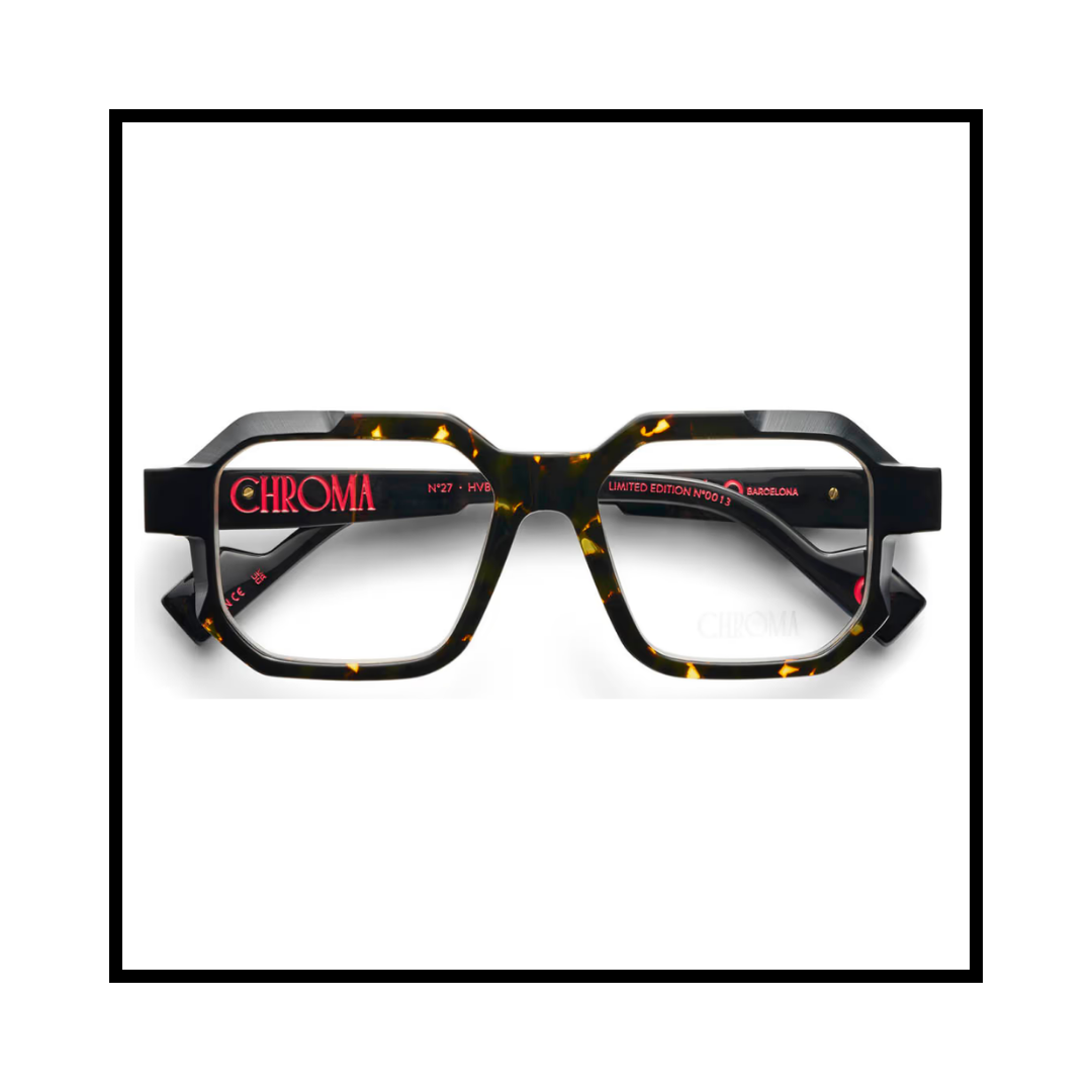 Fashionable eyeglasses with black frames and tortoiseshell accents, featuring red text and details on the inside of the temples.