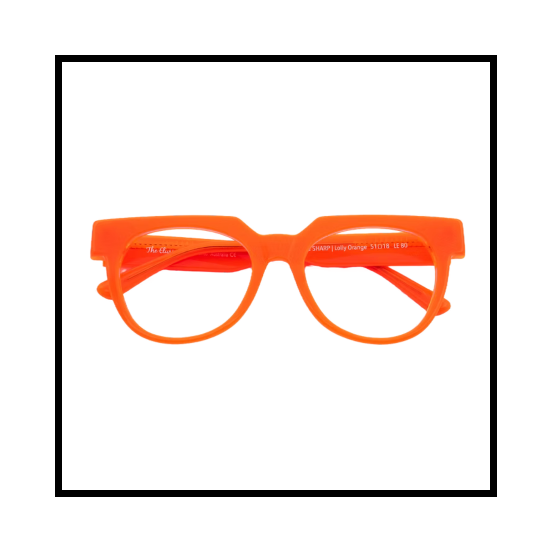 Bright orange plastic eyeglasses with clear lenses on a white background.