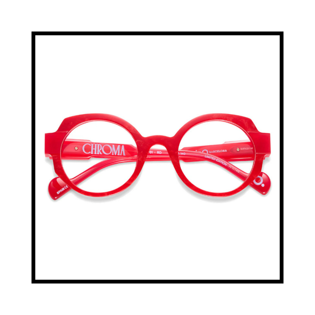 Red round eyeglasses with the brand name 'Chroma' on the inside of the arm.