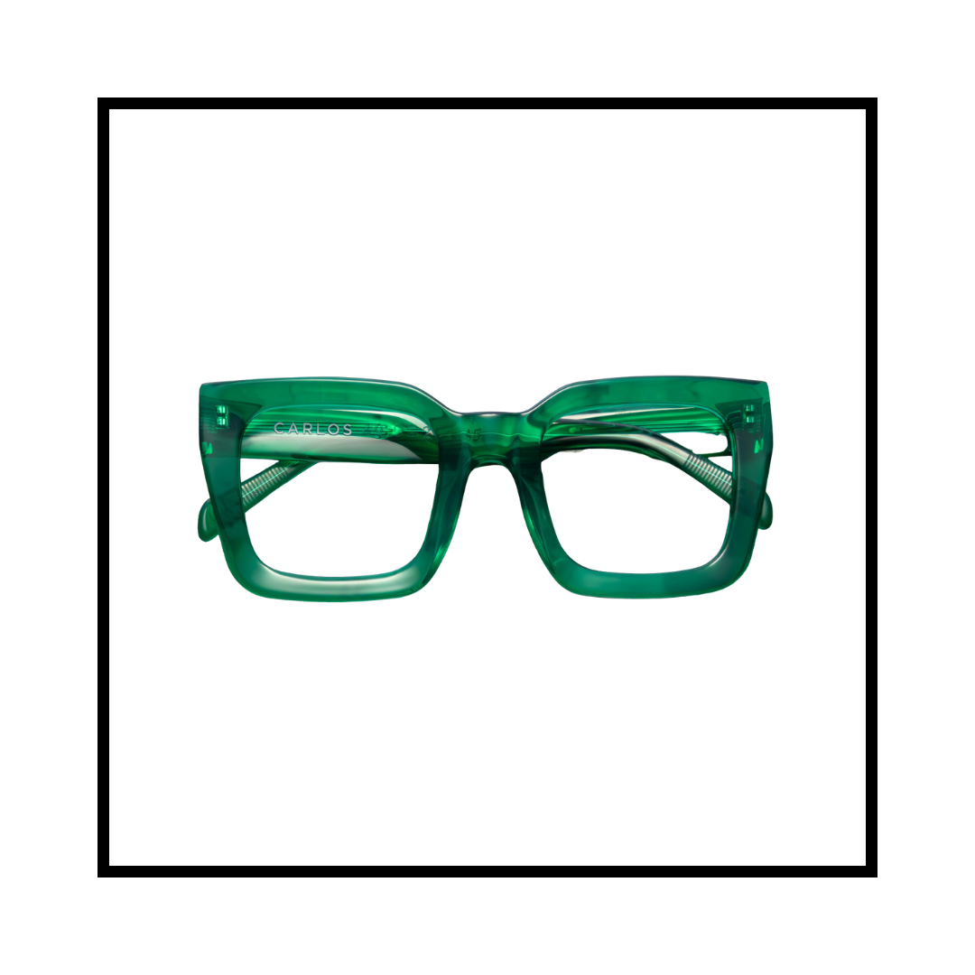 Green thick rimmed eyeglasses with the word 'CARLOS' written on the inside of the left arm