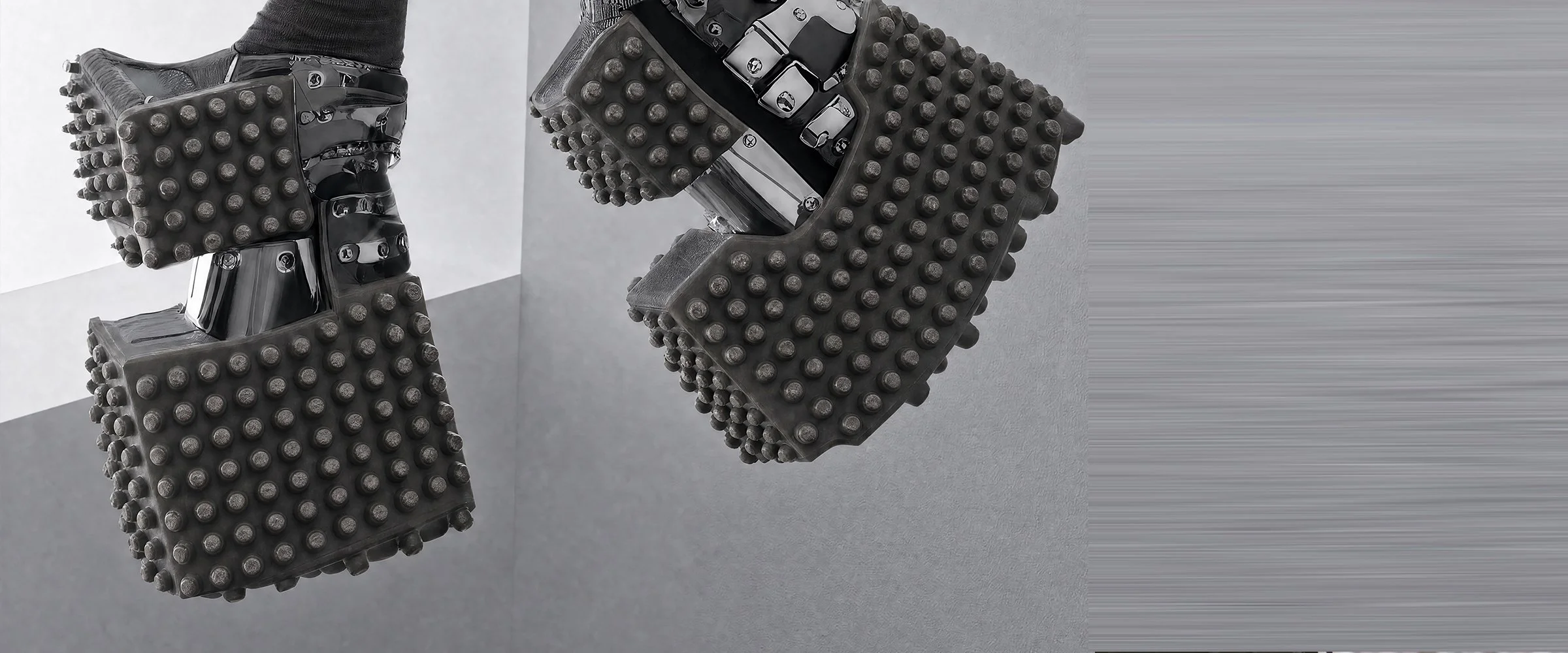 A pair of avant-garde heels inspired by extraterrestrial geological terrains. It features an unconventional design that comprises of a unique way of wearing the heels. The design is accentuated by an exaggerated heels that are textured like geologica