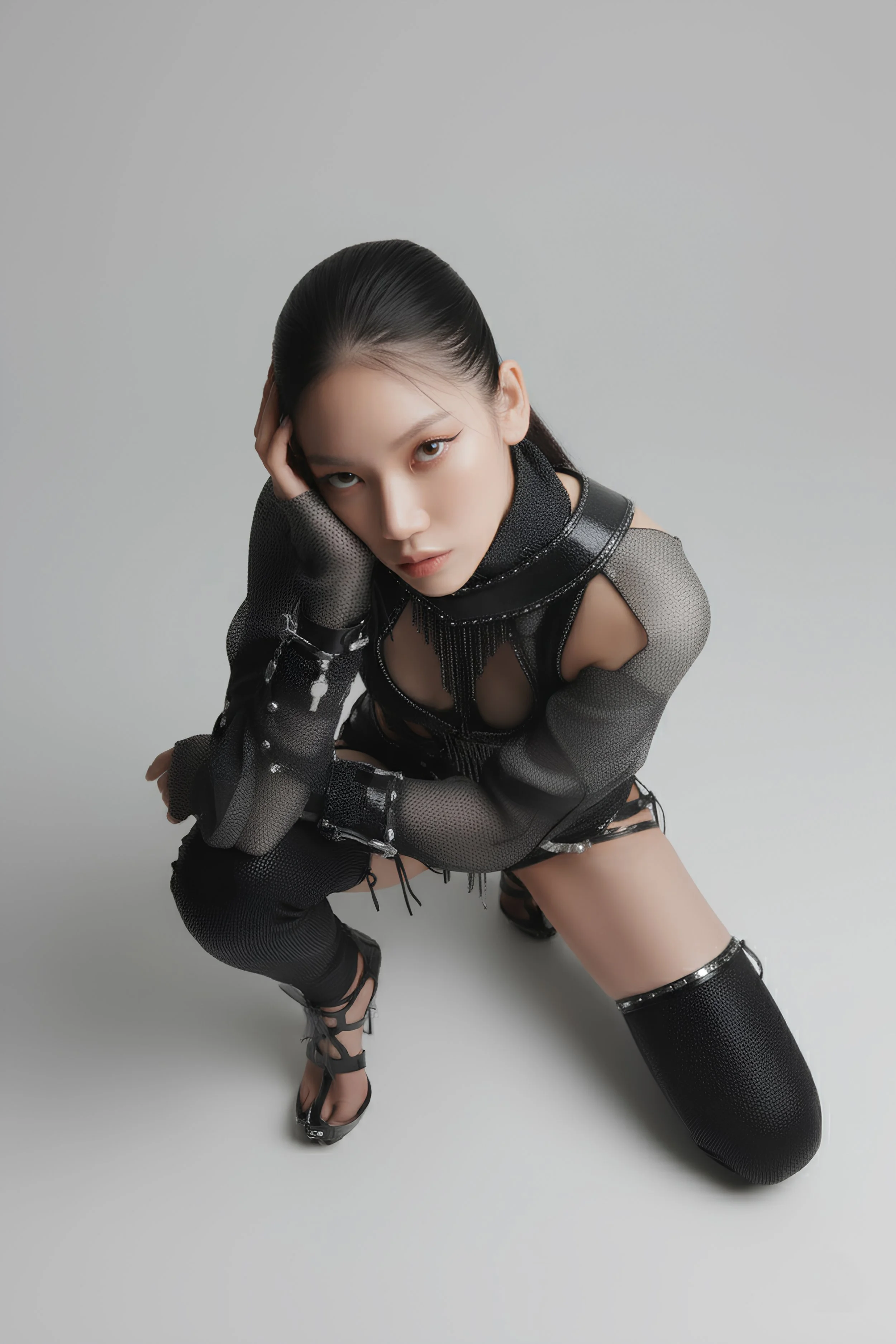 Model posing in a functional yet aesthetic ninja-inspired outfit that is avant-garde and fashionable. She is posing in a studio setting for digital fashion brand [ze Luna]. The outfit is intricate and detailed, combining high fashion with function.