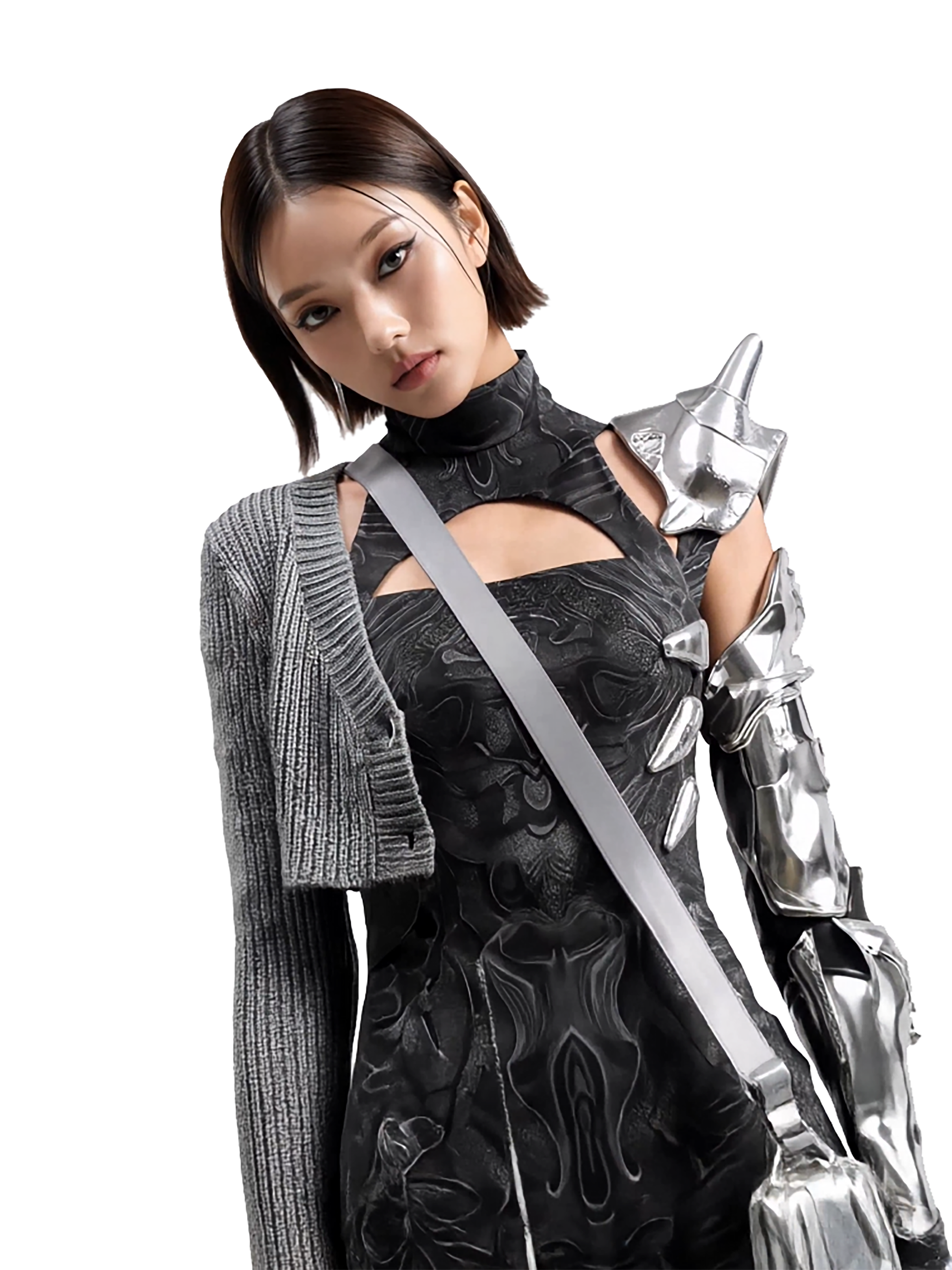 Model and brand ambassador Jun Xeda posing in an editorial photoshoot for digital fashion brand [ze Luna]. She is wearing a bold avant-garde black dress with chrome armor like accessories, with black stockings and a chrome bag and a grey half coat.