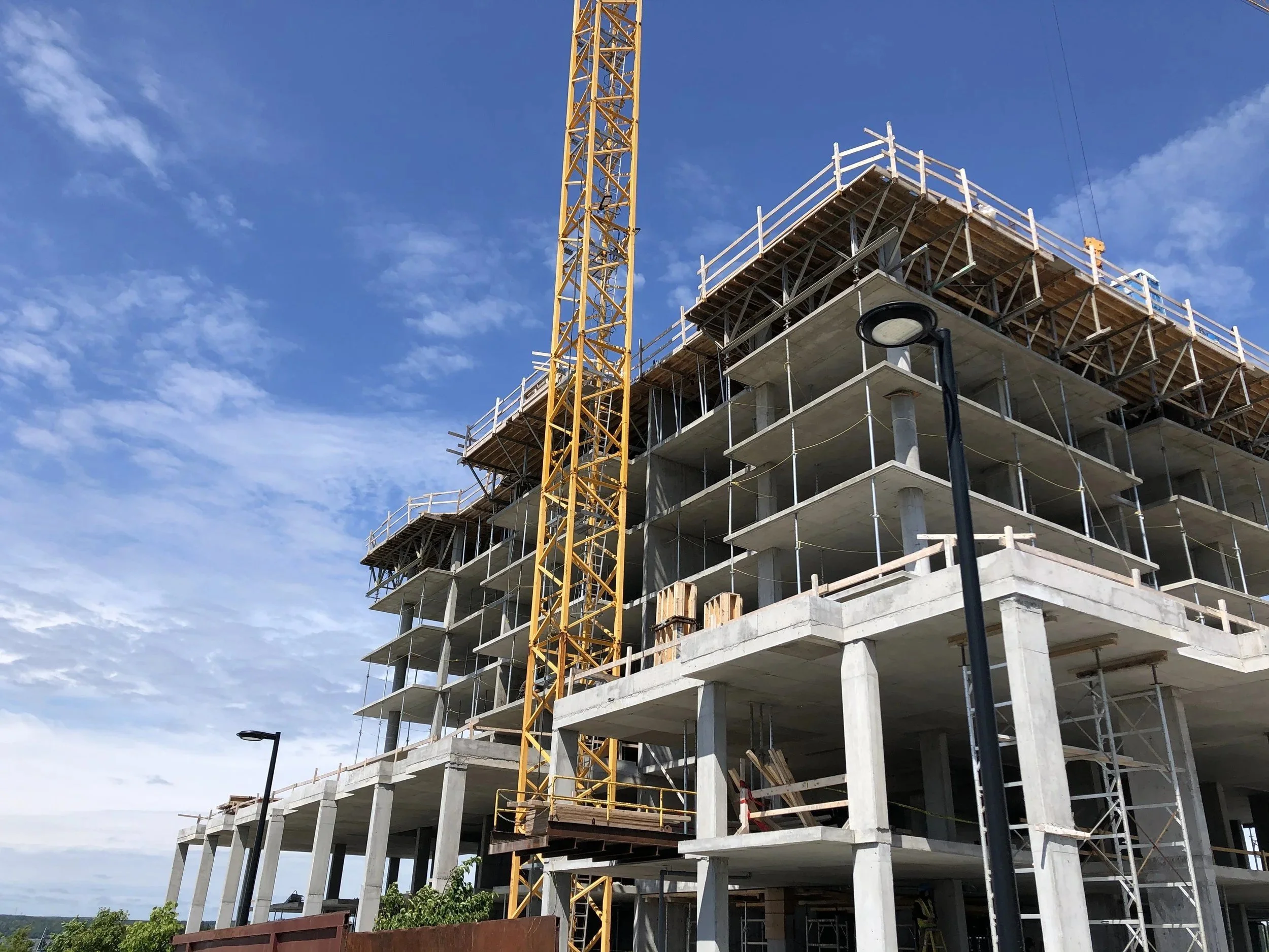 Harbour Isle townhouse podium with residential towers behind