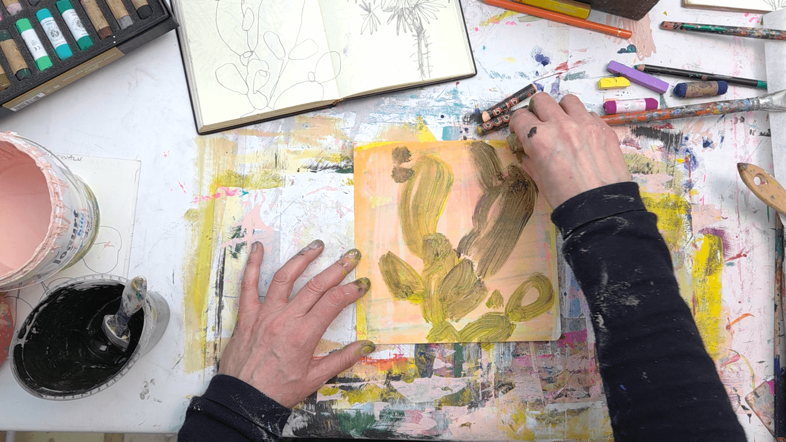 Mixed media colour experiments on small sheets of paper using sponge painting, part of an artist’s process before starting a painting series.