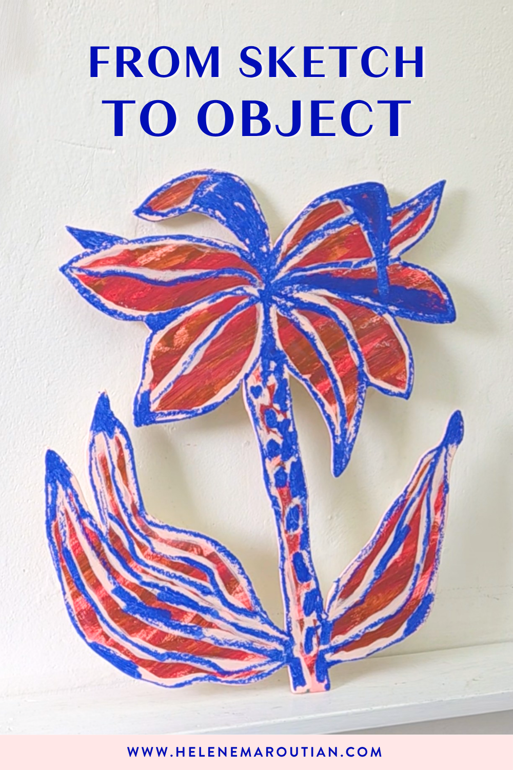 a cut out palm tree painted on red and blue, leaning against a white wall