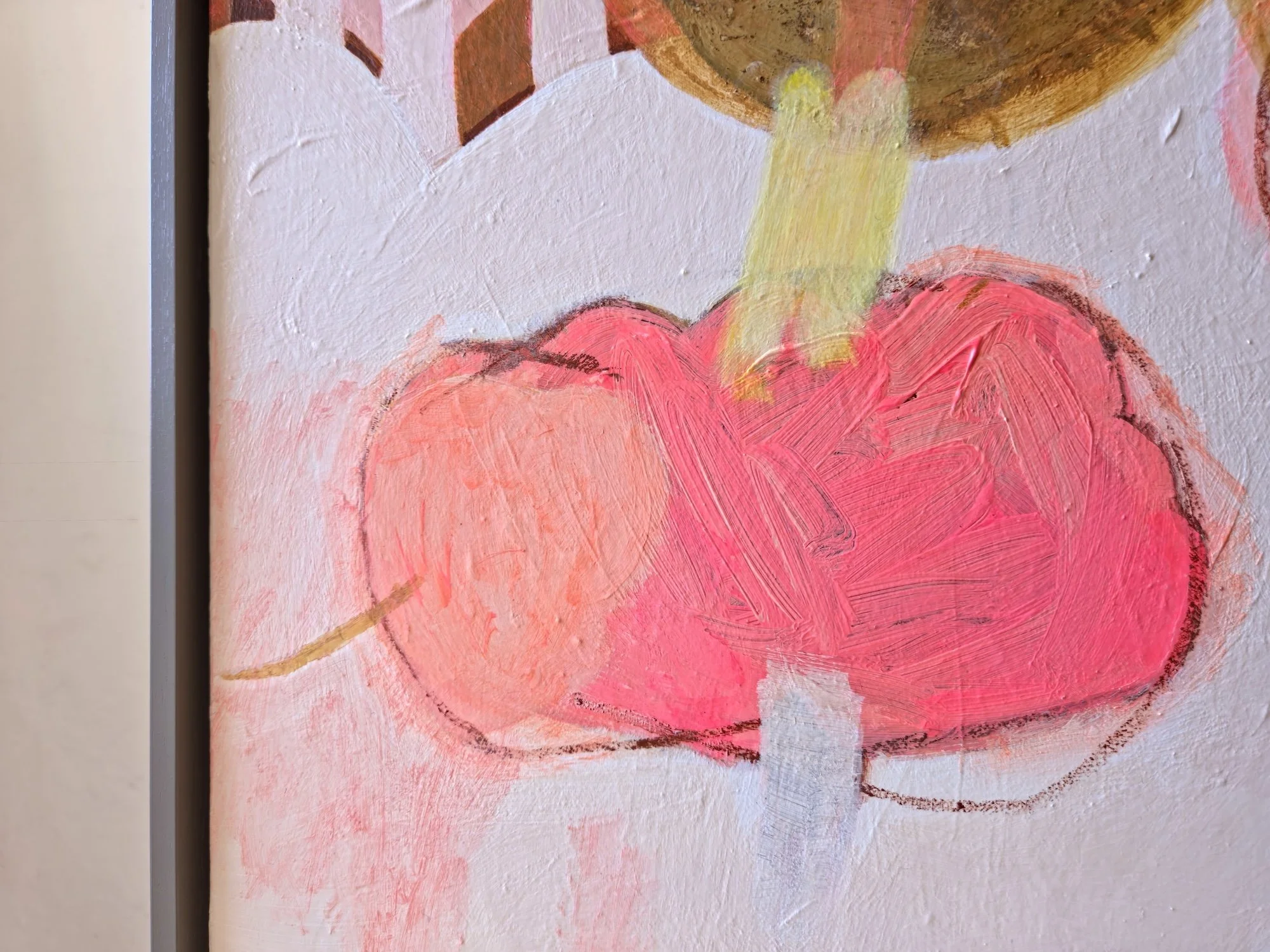 detail of framed botanical painting in pinks and browns with bold stripes