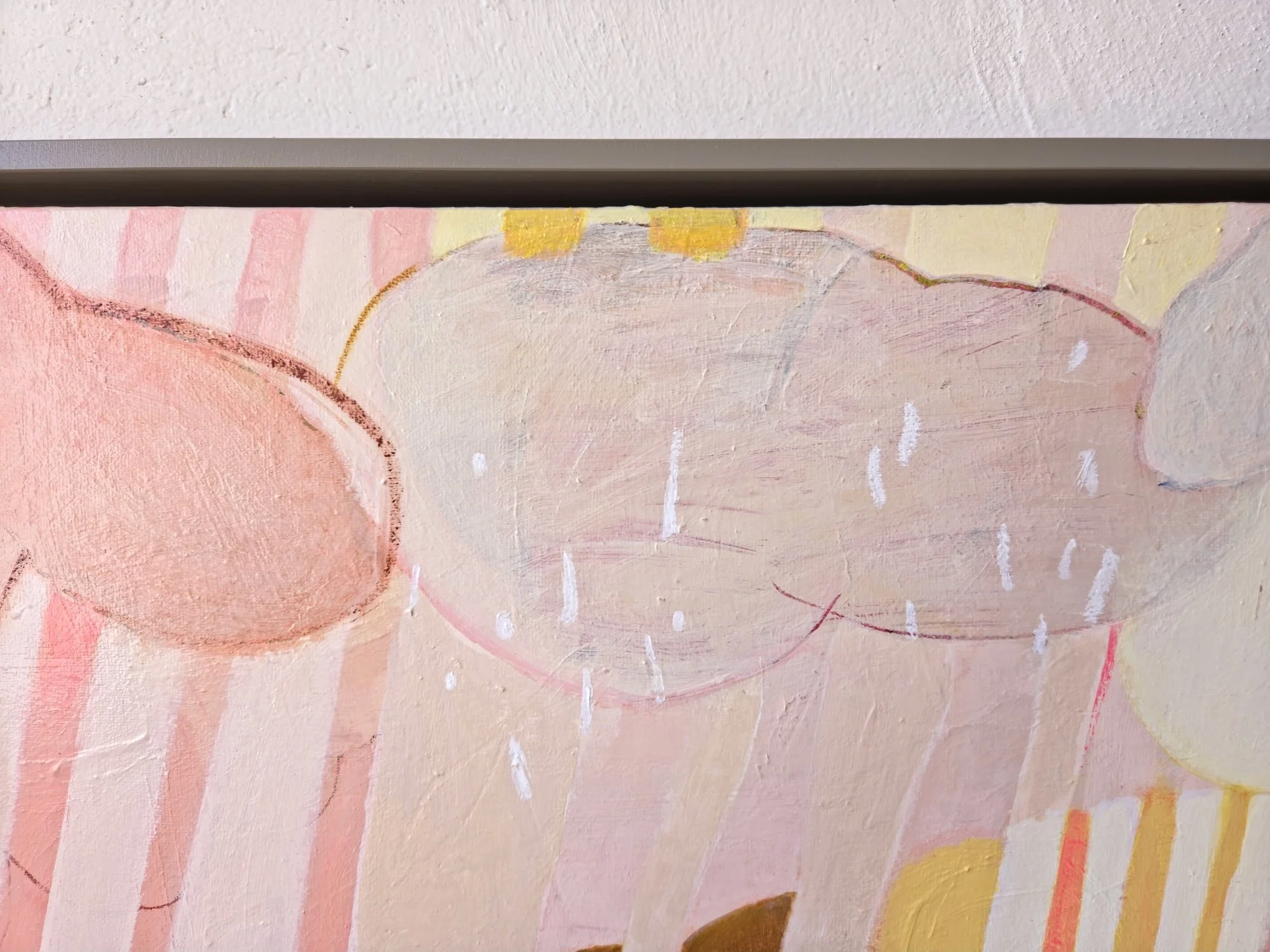 detail of framed botanical painting with colourful striped background