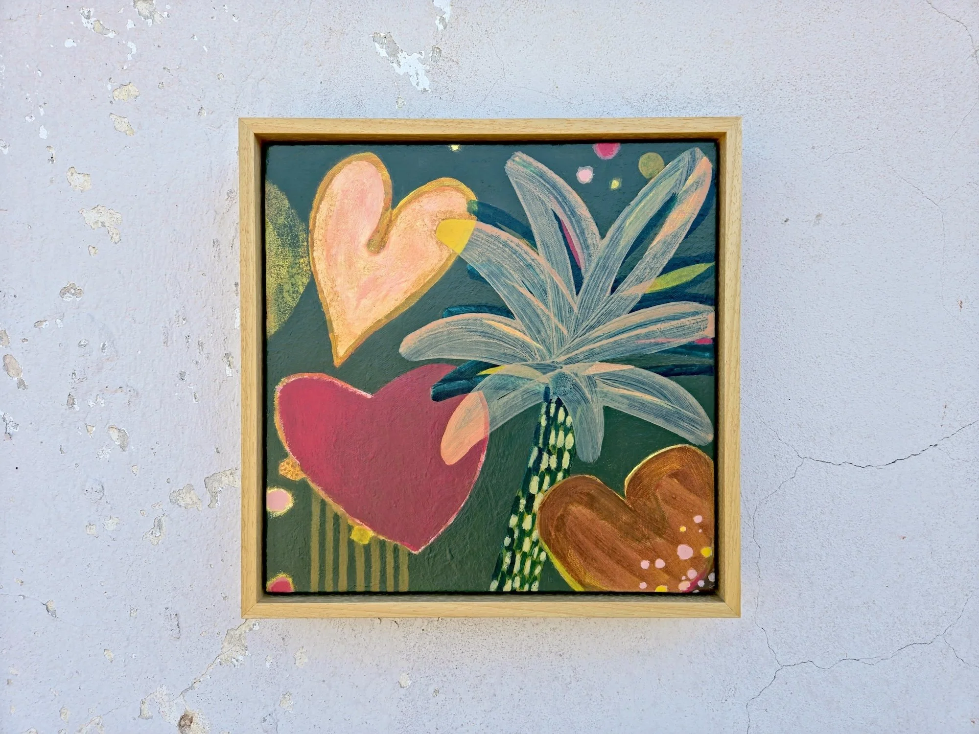 framed botanical painting in red, browns and greens