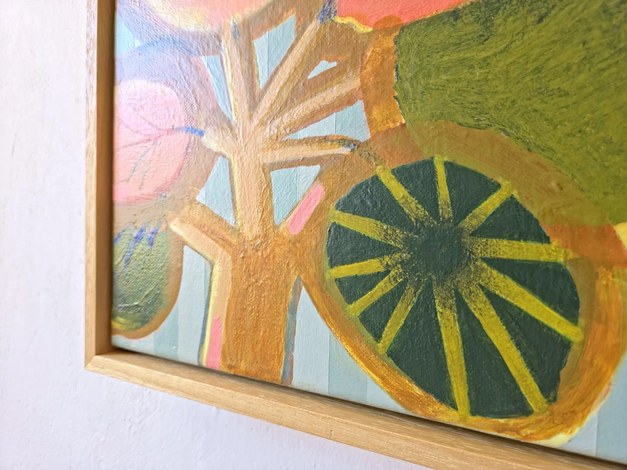 detail of botanical painting in bright pinks and greens on a striped background