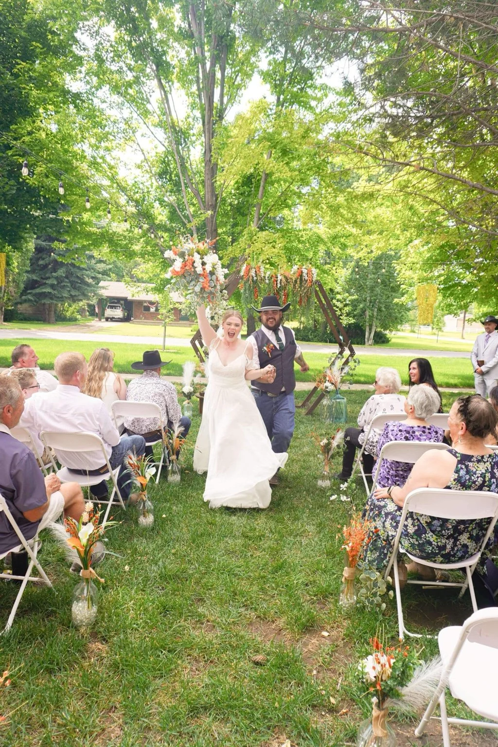 Newlyweds celebrating after an intimate outdoor ceremony in Ogden Valley.