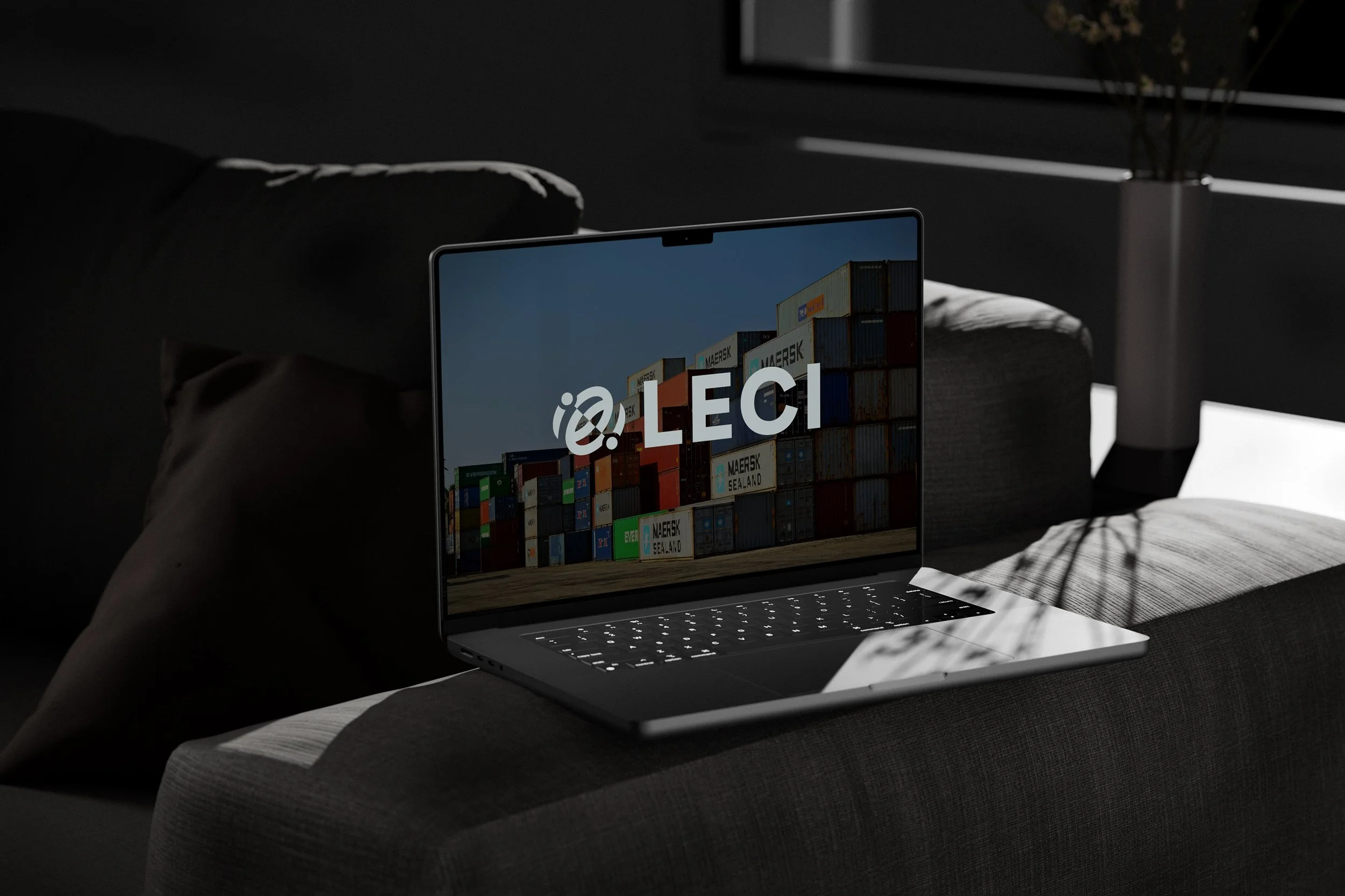 Free-MacBook-Pro-on-Settee-Mockup.jpg