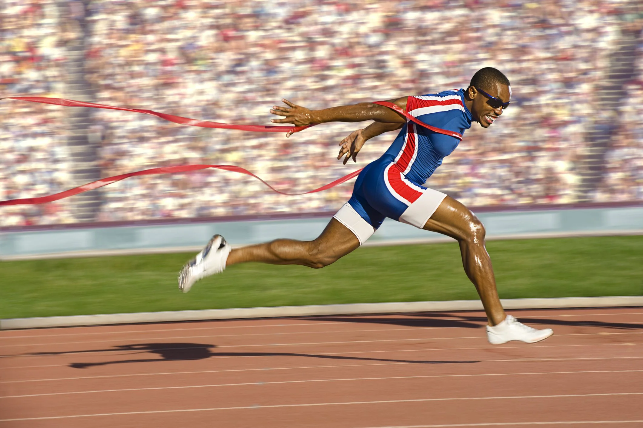A track athlete winning the race