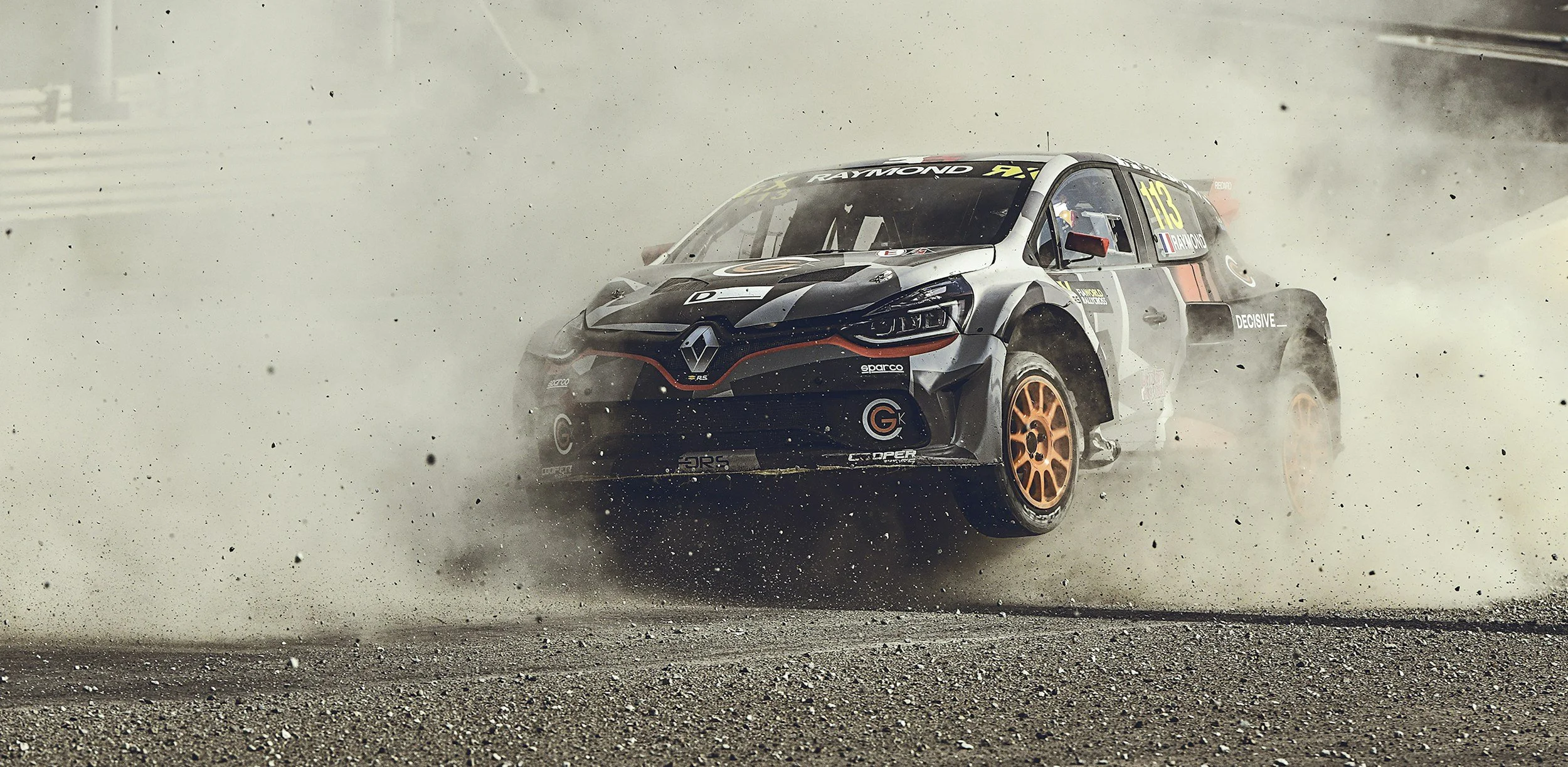 A professional rally car driver competing after using mental training with Ben Foodman