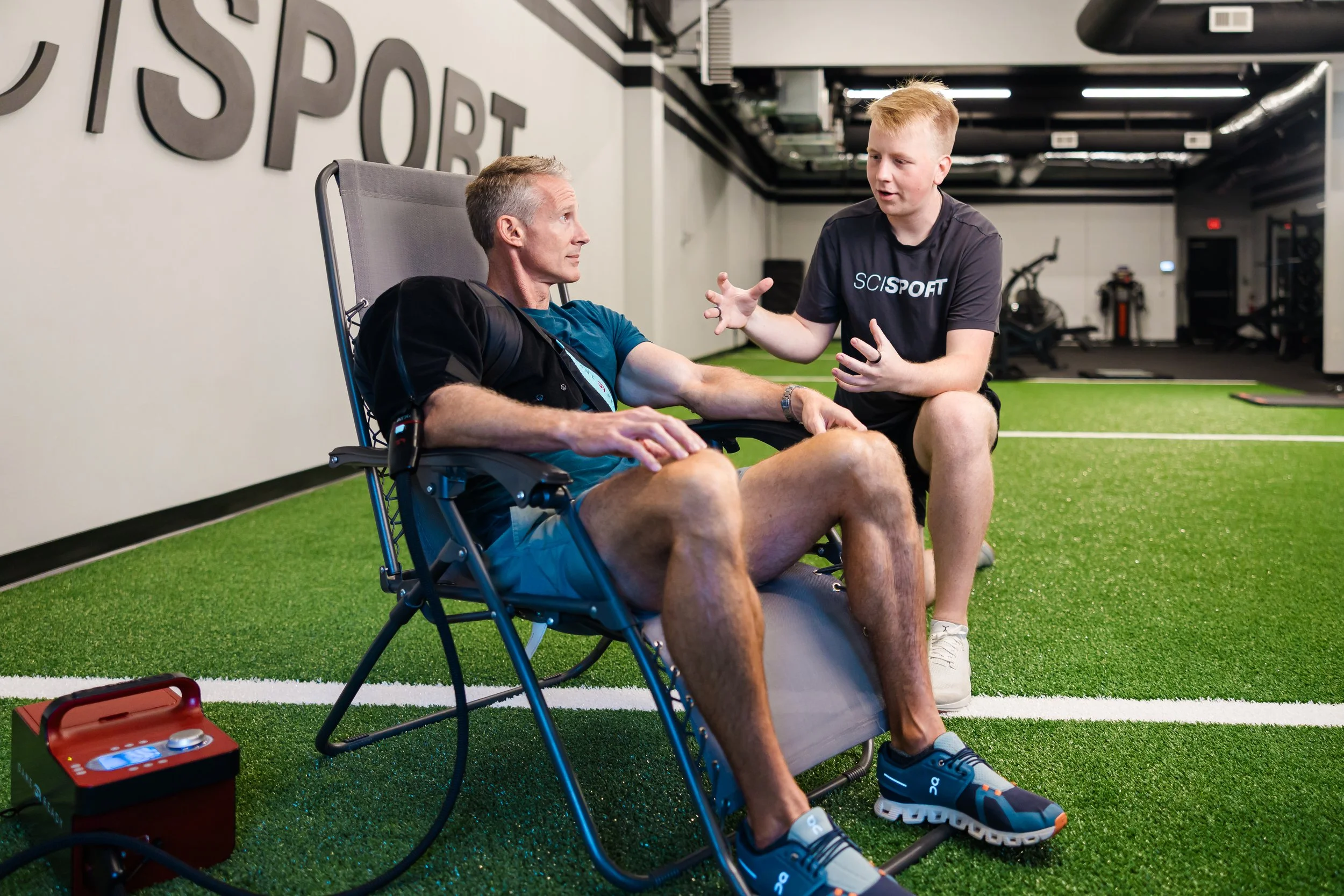 Athlete receiving GameReady cold and compression therapy for injury recovery at sports performance and physical therapy clinic in Wilmington, NC