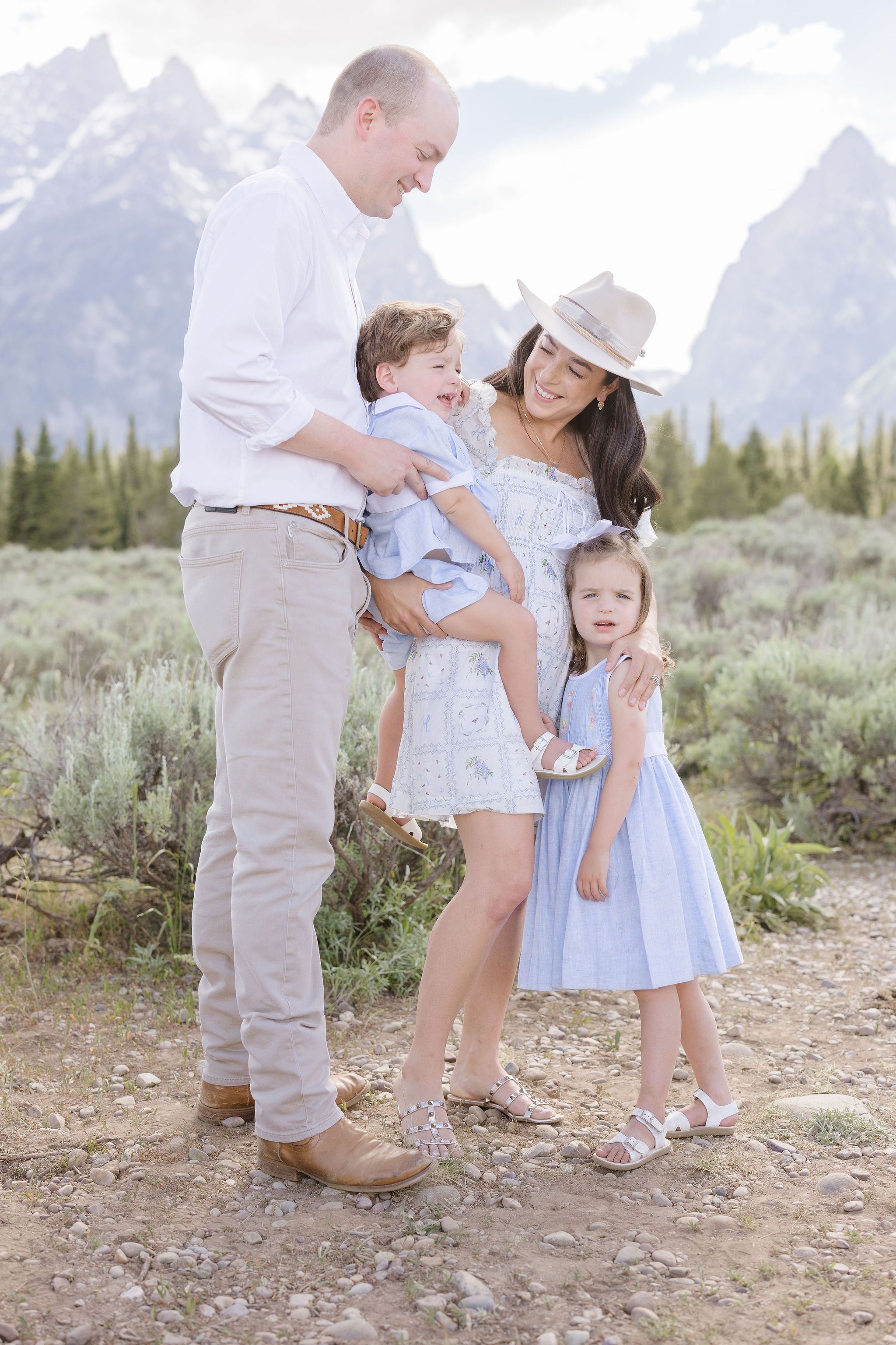 Photographer captures beautiful summer family photo outfits that look great in the Tetons.