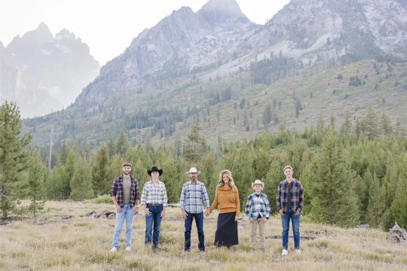 One of the best things to do in Jackson Hole this fall is to take family photos with a local photographer in the Tetons.
