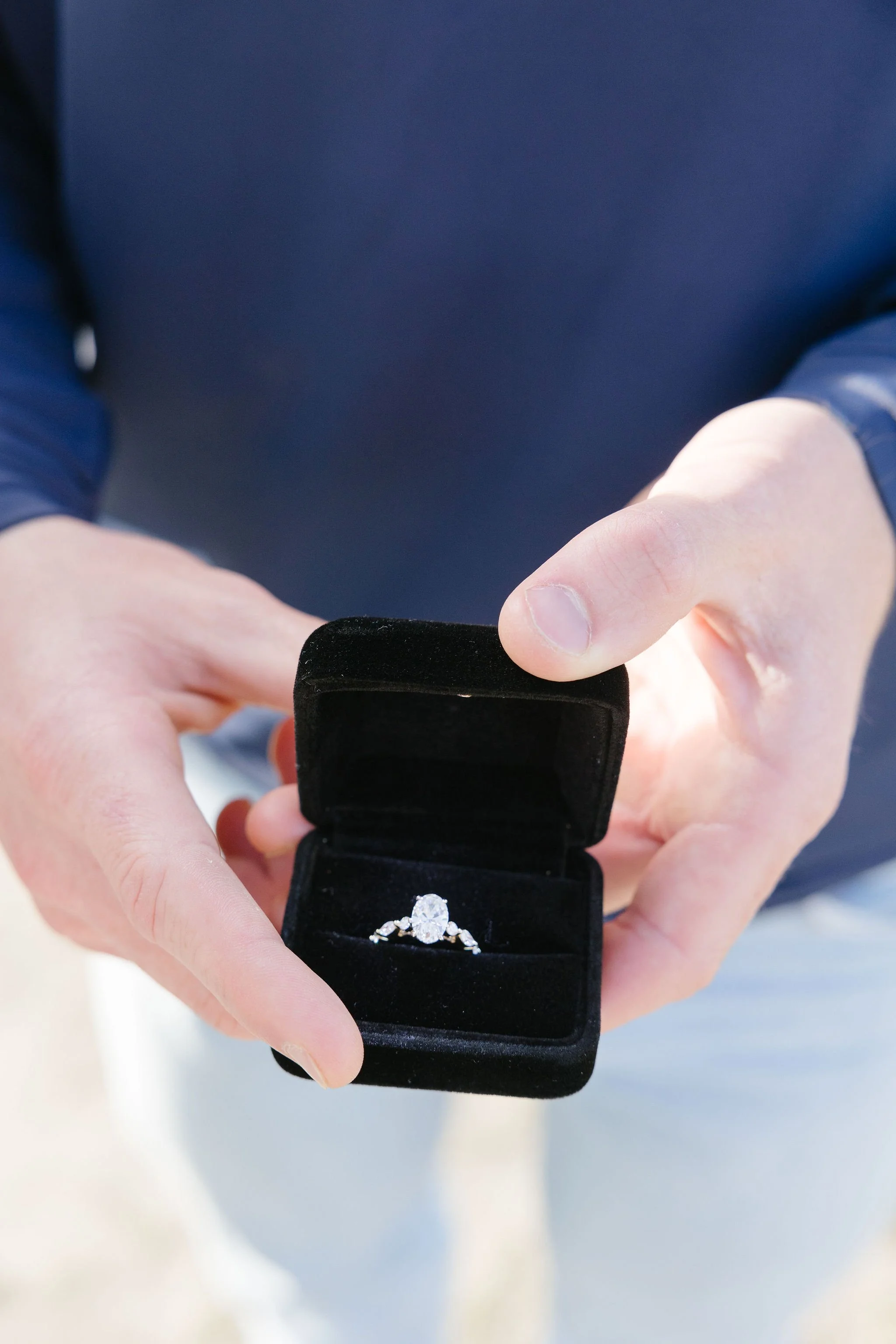 Close up shot of engagement ring in block box. 