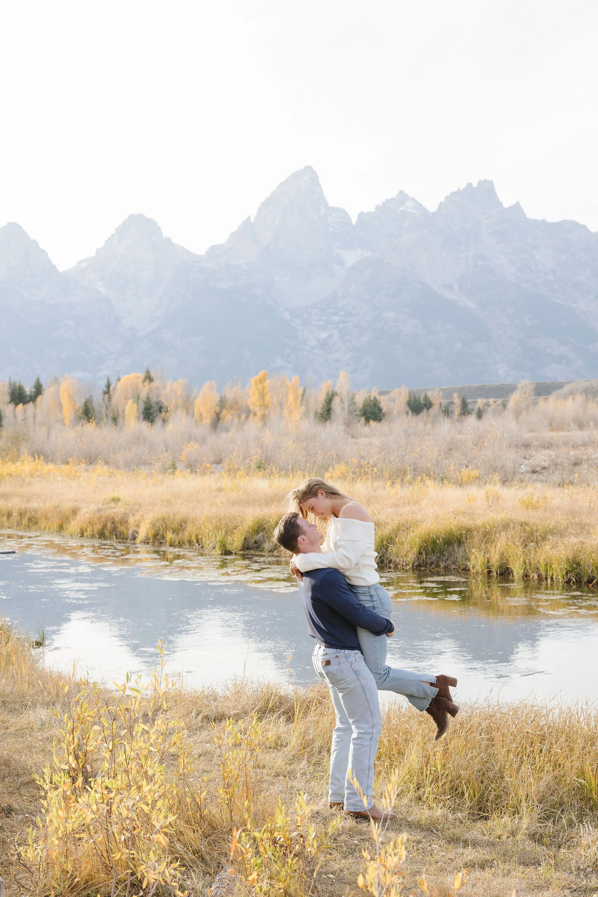  Jackson Hole proposal photographer transitions couple into engagement photos after a surprise proposal in the Tetons. 