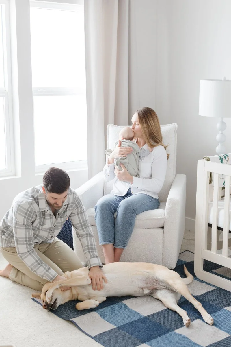  Lifestyle photographer captures family during newborn photoshoot. 