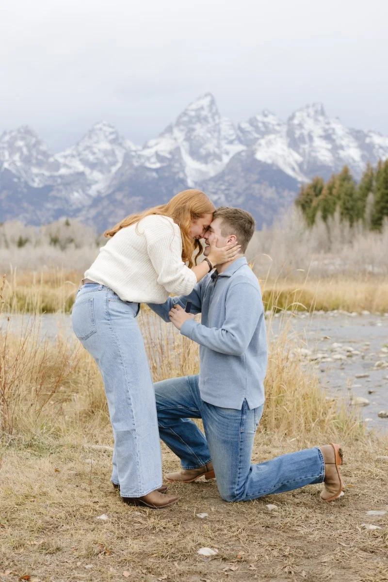  Emotional engagement moment after a proposal during a Jackson WY photographer session 