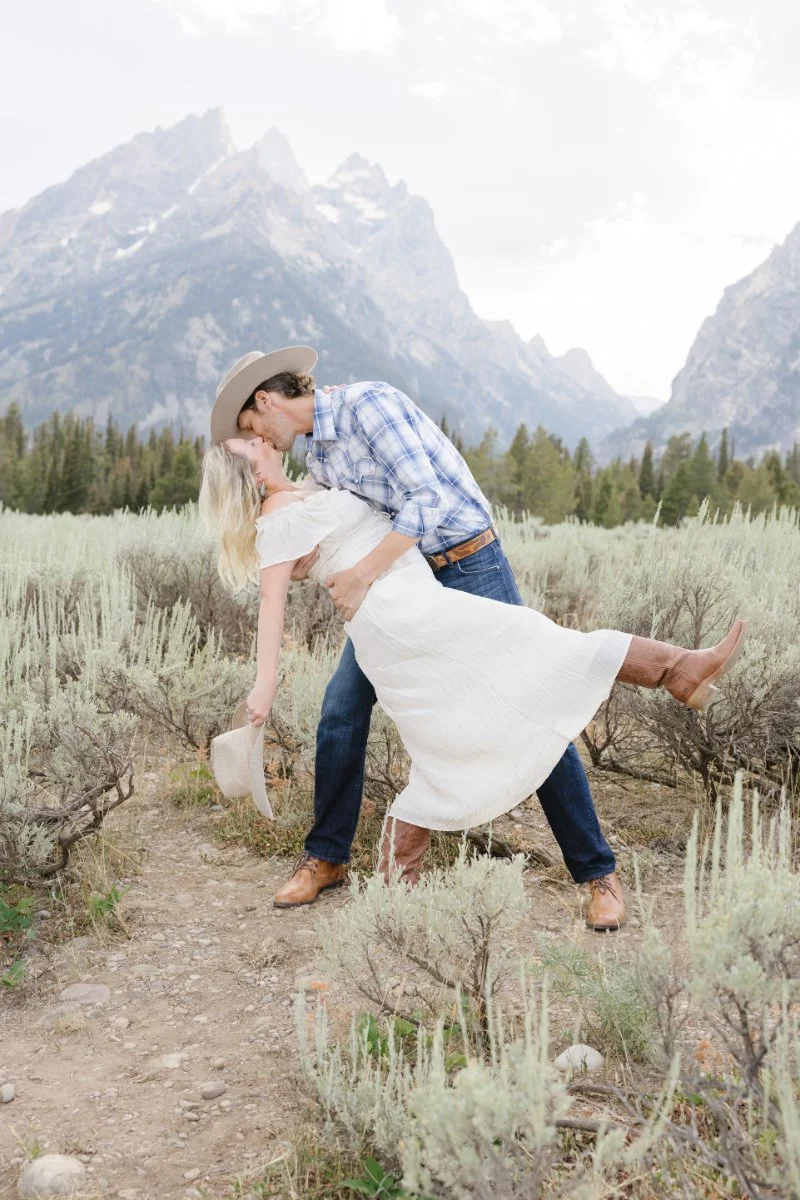  Couple during a Jackson Hole photography session with the Teton Mountains in the background 